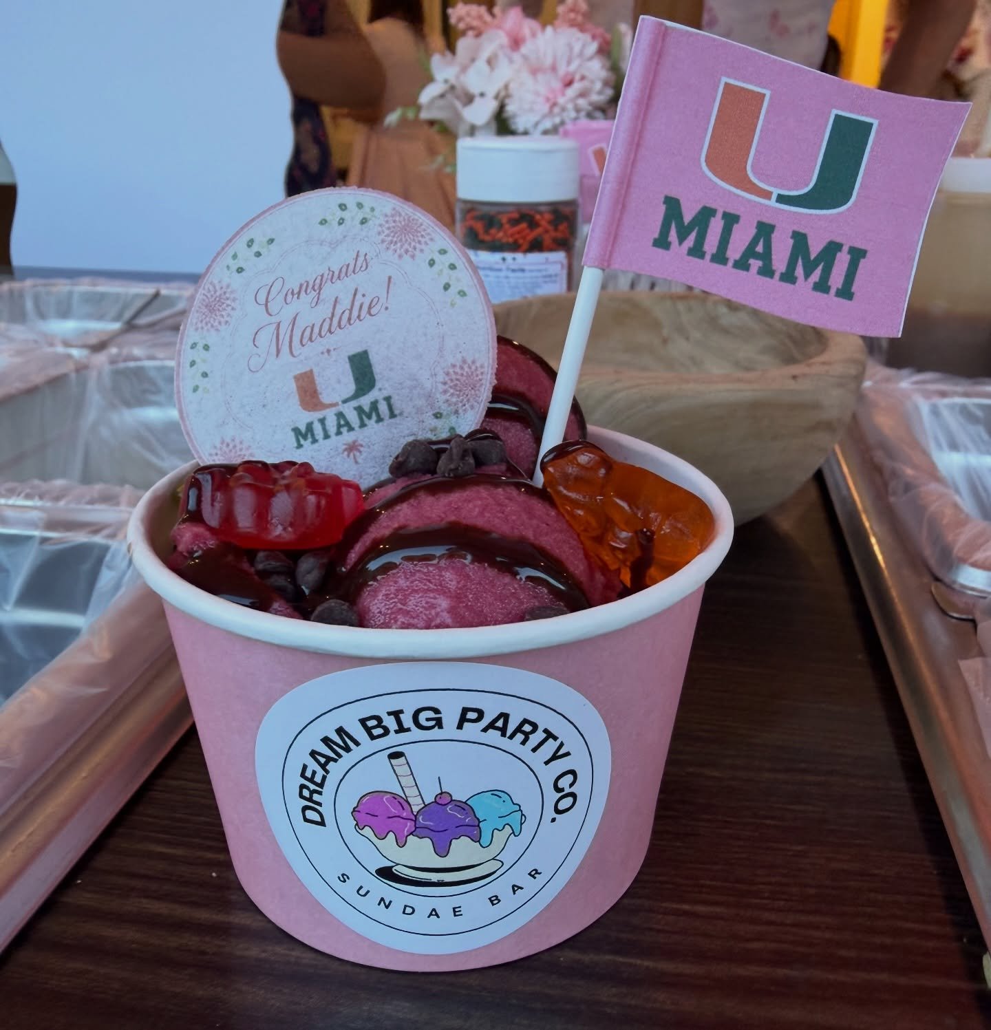 Our custom Madeleine Sundae Bar was so perfect to celebrate sweet Madeleine's Graduation and acceptance to @univmiami 🧡💚🩷 Sometimes clients turn into friends and this family is definitely one of them. Thank you for allowing us to celebrate all of 
