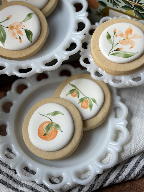 Oranges and Blossoms on Plates.png