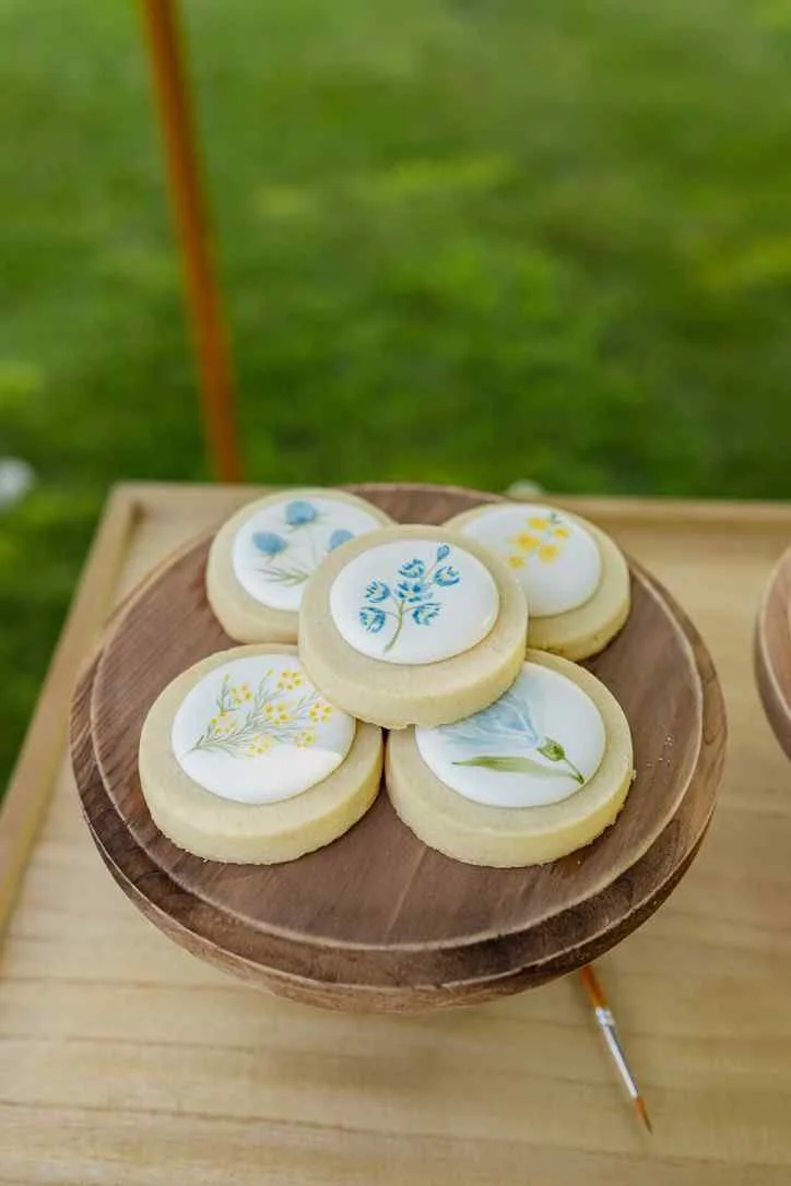 Freshly Painted Cookies Displayed on Cake Stand.jpg