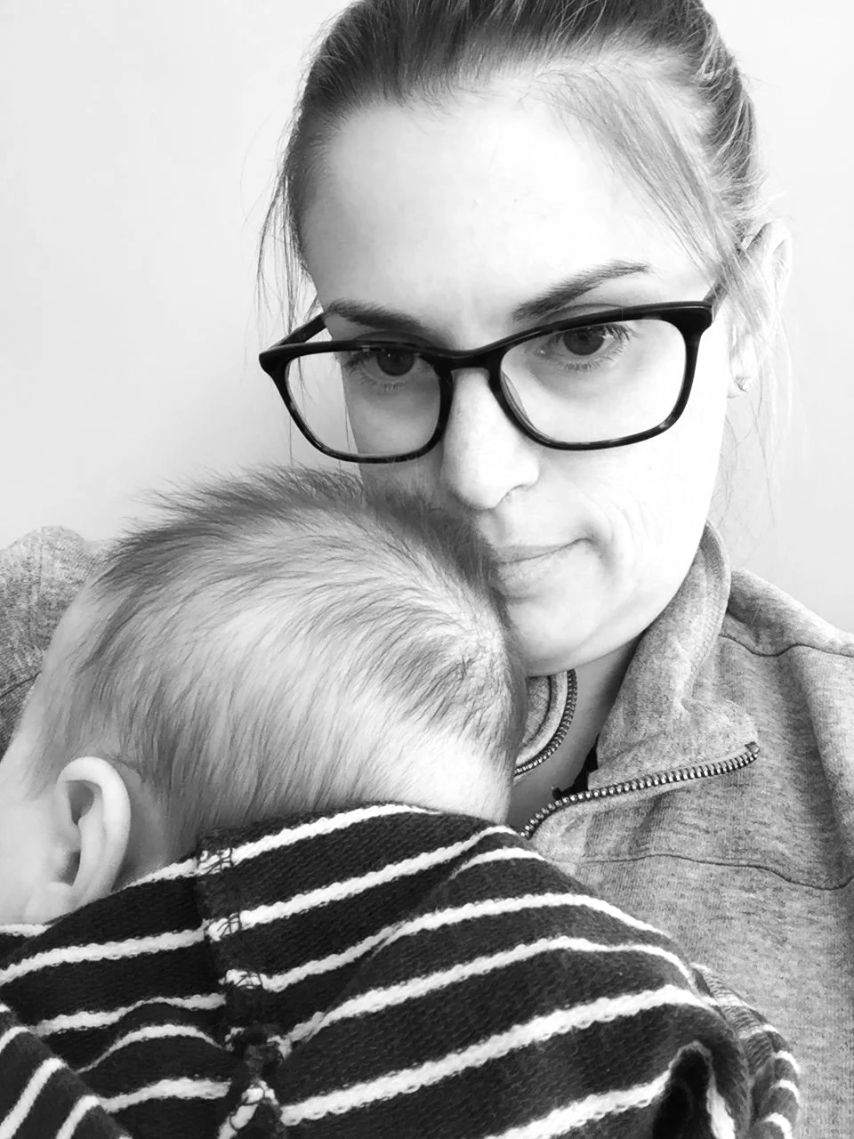Tired new mom struggling with sleep deprivation and mental health.