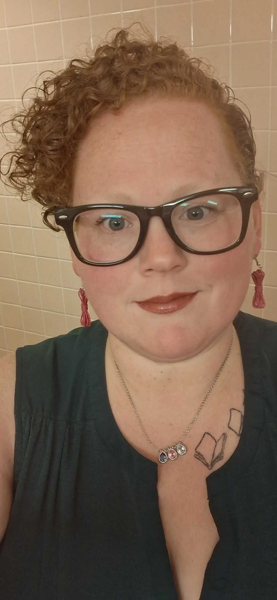 A photo of Alli Faber, Director of Communications, for the Lancaster Pride Board