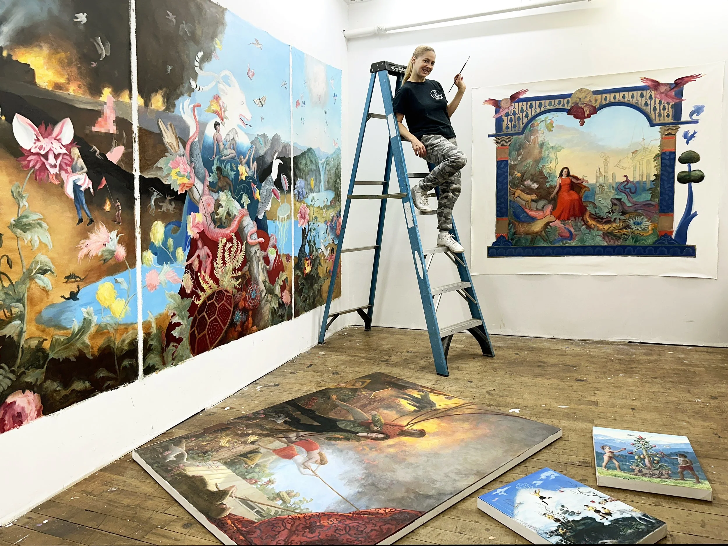 K on ladder in studio.JPG