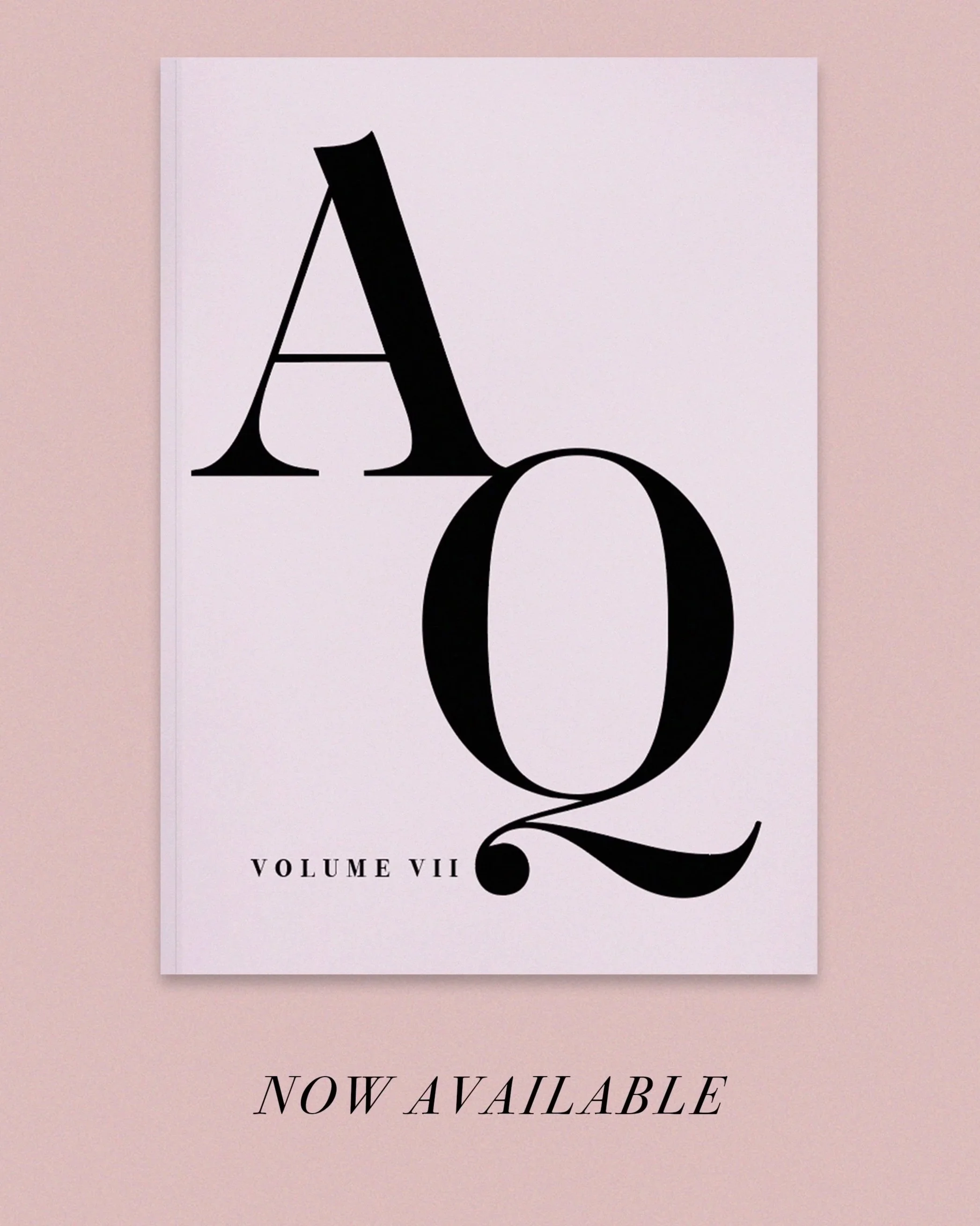 Book cover with large black text 'A 2' and smaller text 'Volume VII' and 'Now Available' on a light pink background.