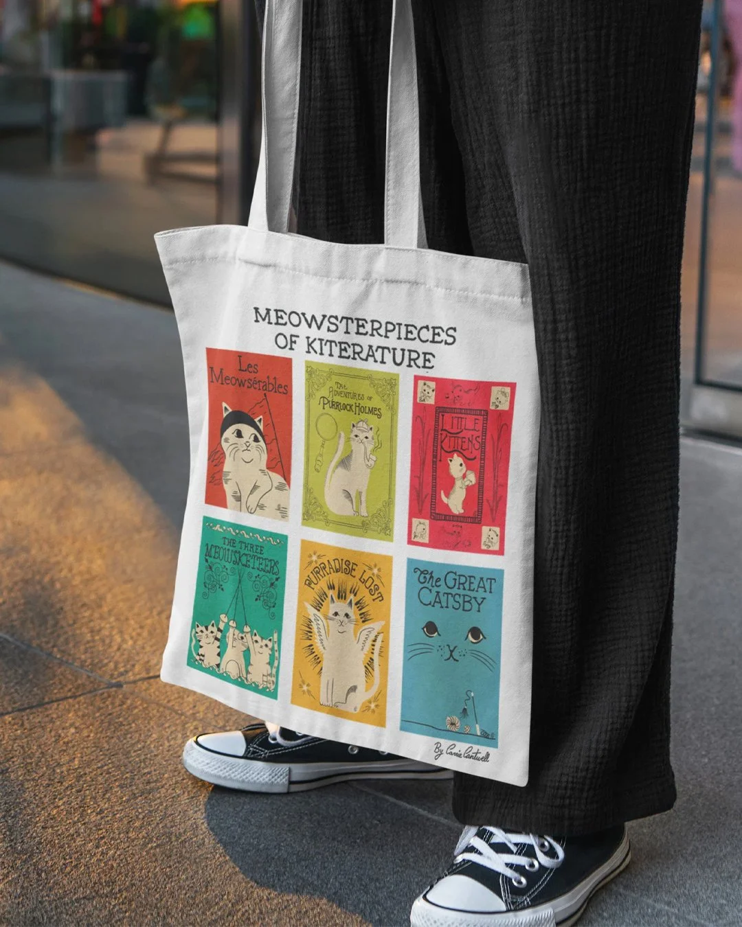 Tote bag featuring Carrie Cantwell's Meowsterpieces of Kiterature cat pun book covers