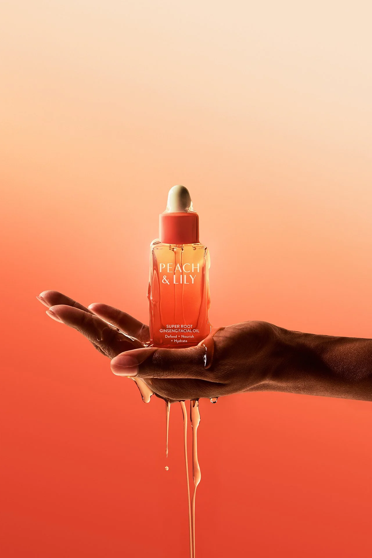 SuperRootGinsengFacialOil_10162025_HandwithBottle.jpg