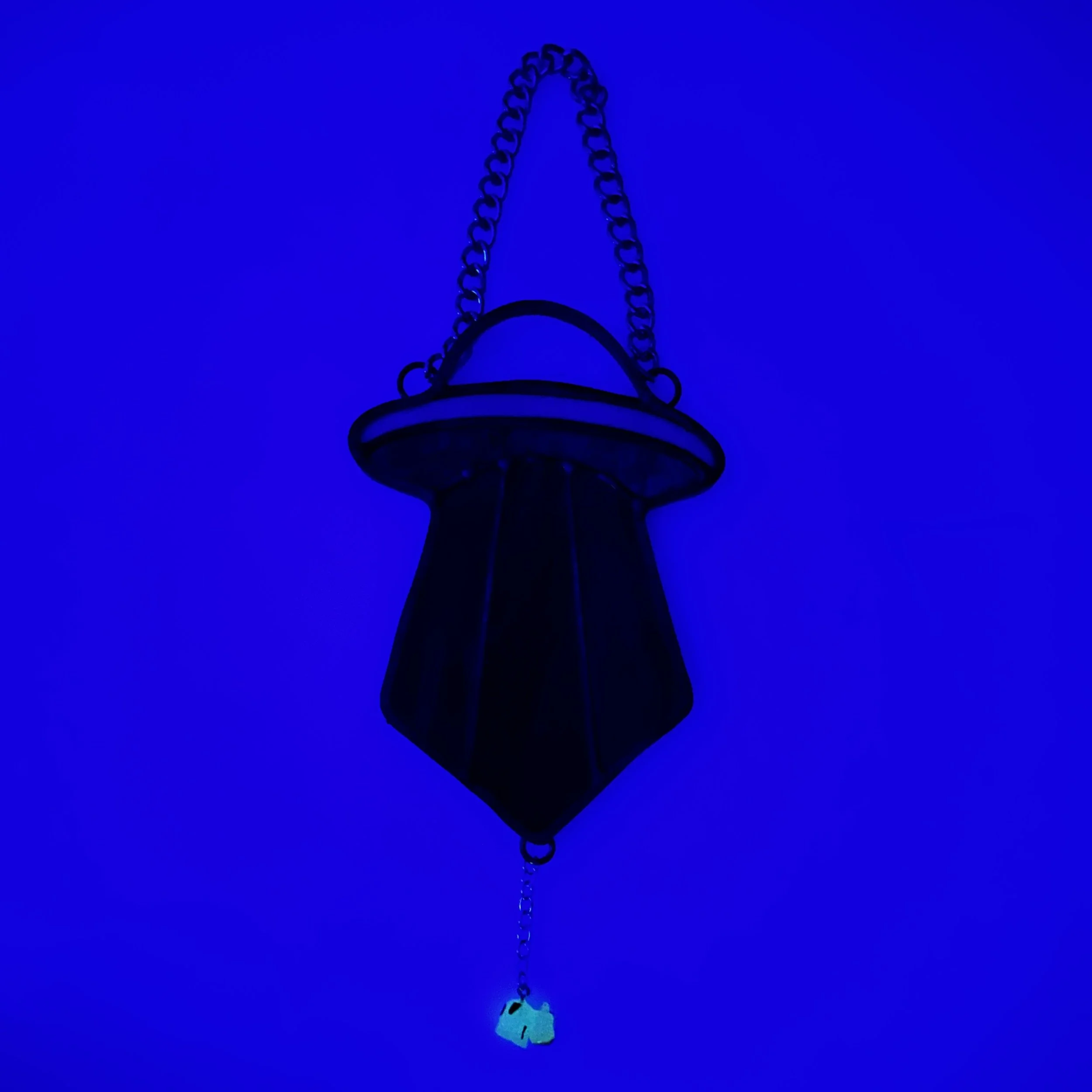 UFO Ornament abducting a glow in the dark cow