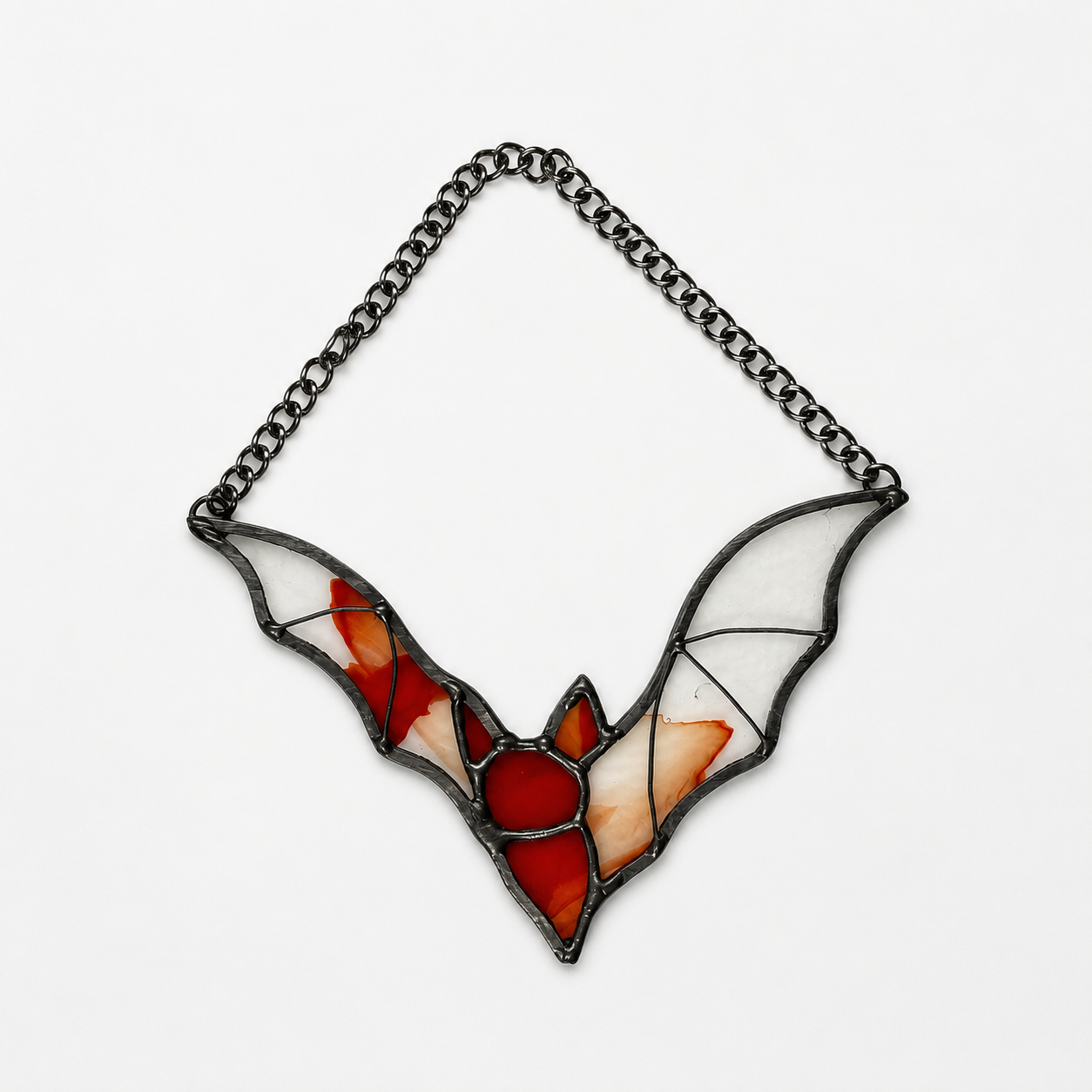 Red and clear flying bat stained glass