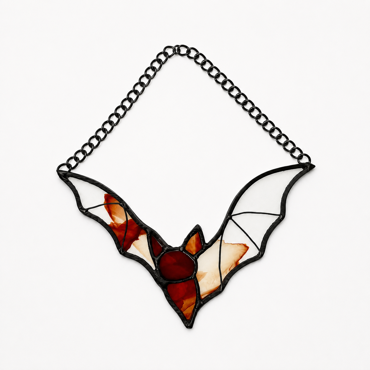Red and clear stained glass flying bat
