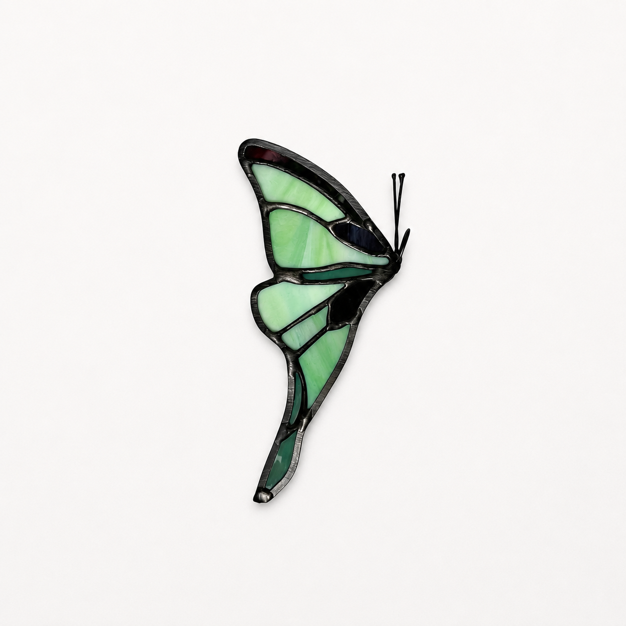 Luna moth tailwing stained glass