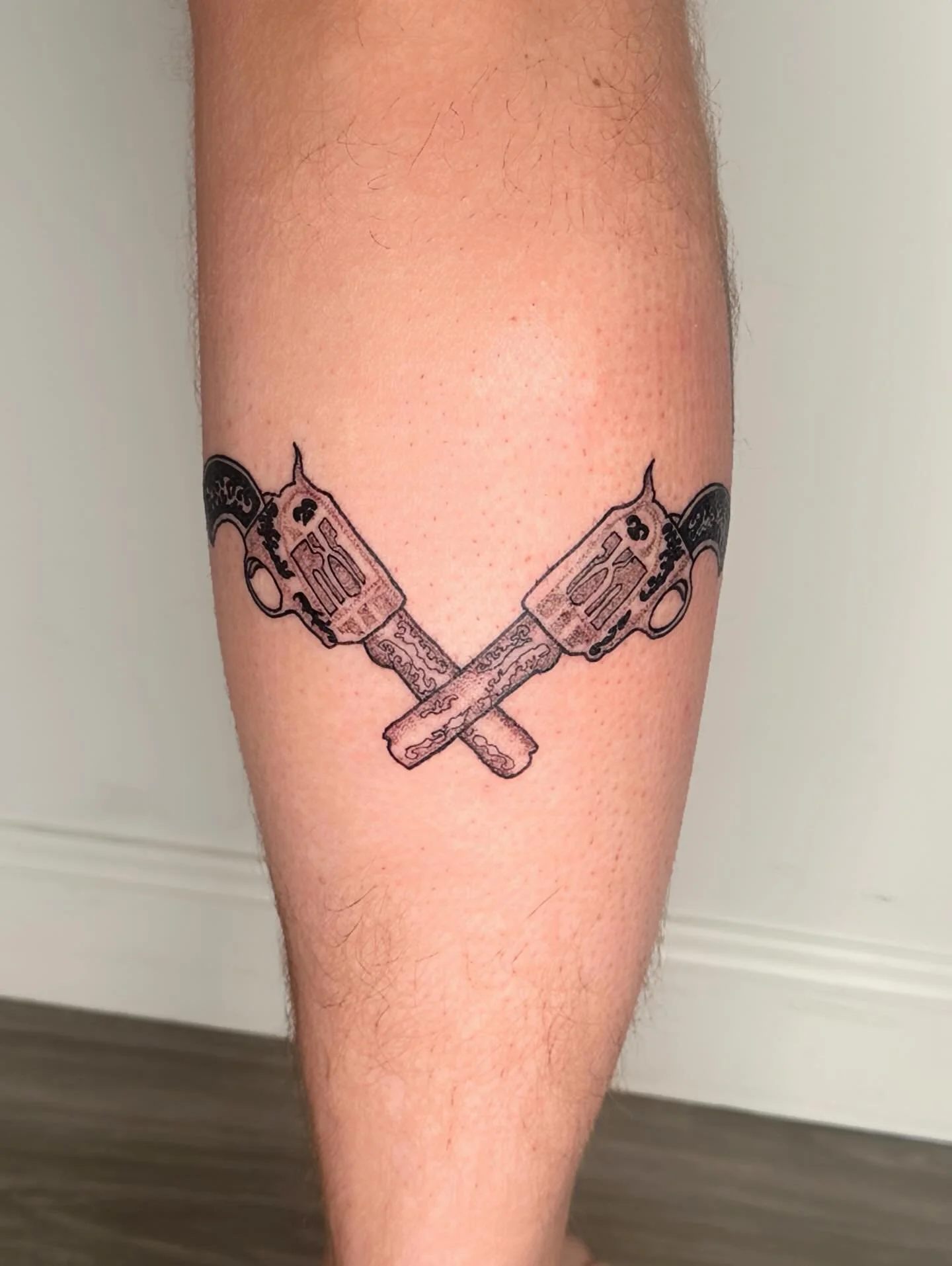 🔫💥🤠 by @saintshivs 

This town ain&rsquo;t big enough for all the talent we have💪 And Shivs is taking no prisoners in this piece! 

Shivs is our in-house black and grey artist🖤🩶 They play with tradition, neotraditional, cybersigilism, and text❤
