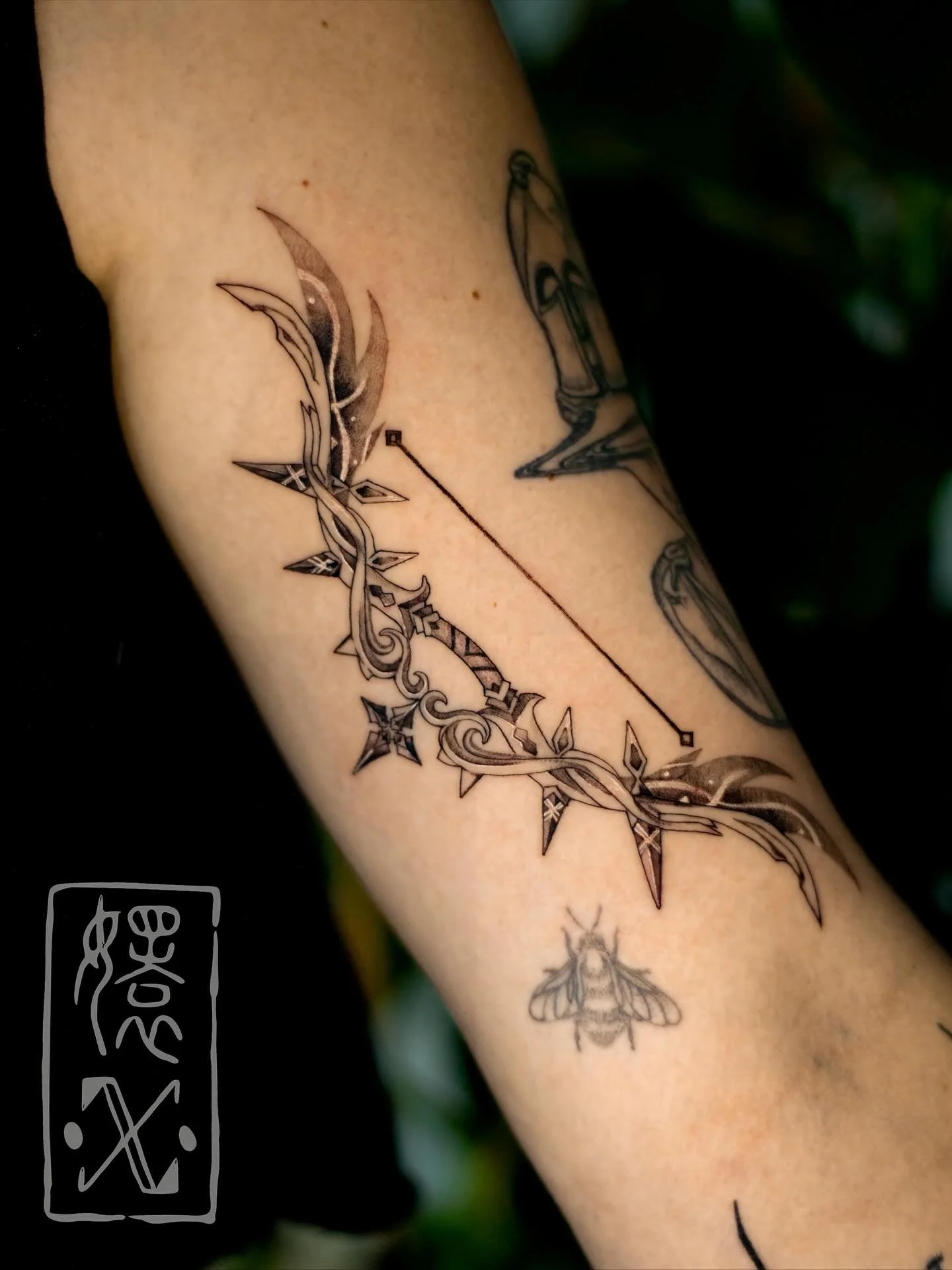 🏹❄️⭐️ by @snayke.tattoo 

Tartaglia&rsquo;s Polar Star bow looks so crispy in this black and grey piece by Crys😍 

Have a favorite Genshin or video game weapon you want immortalized on your skin? Use the link in our bio or reach out to @snayke.tatt