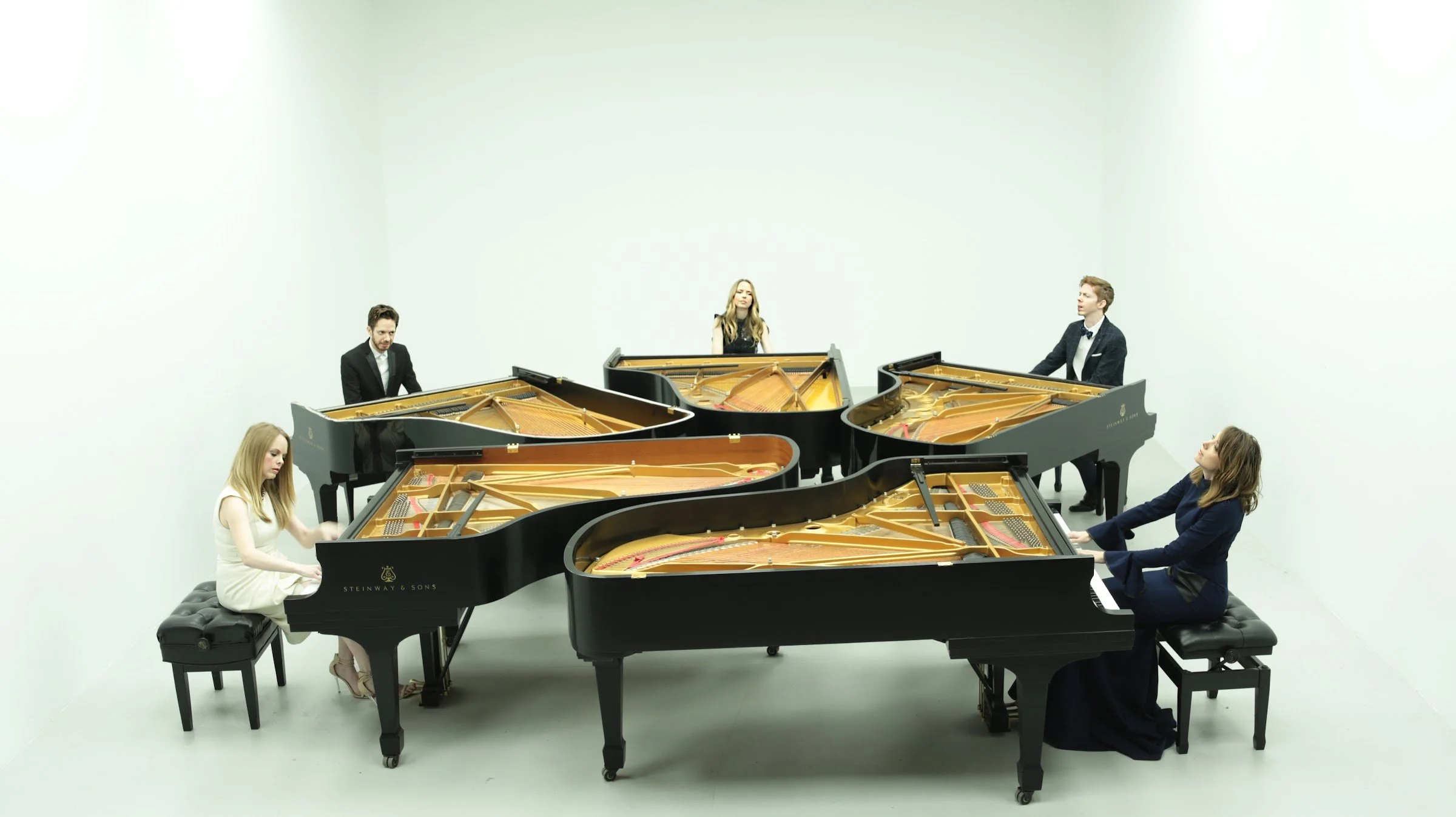 The 5 Browns, classical sibling ensemble playing on five Steinway Grand pianos. 