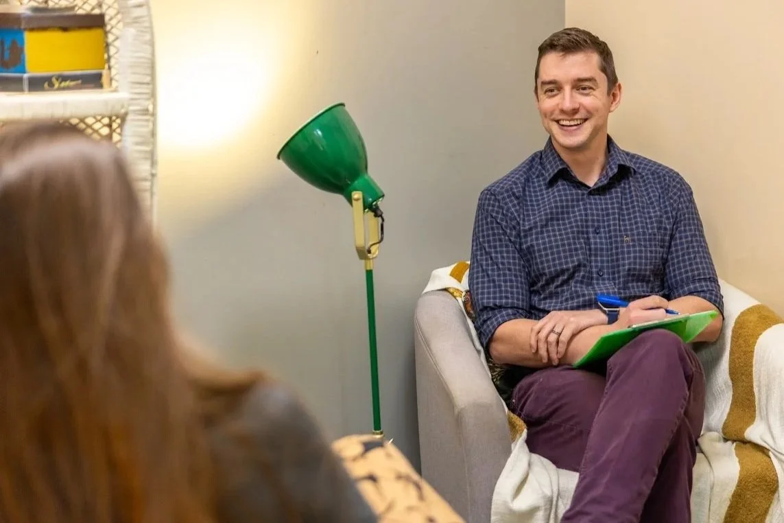 HR manager discussing workplace mental health strategies with employee