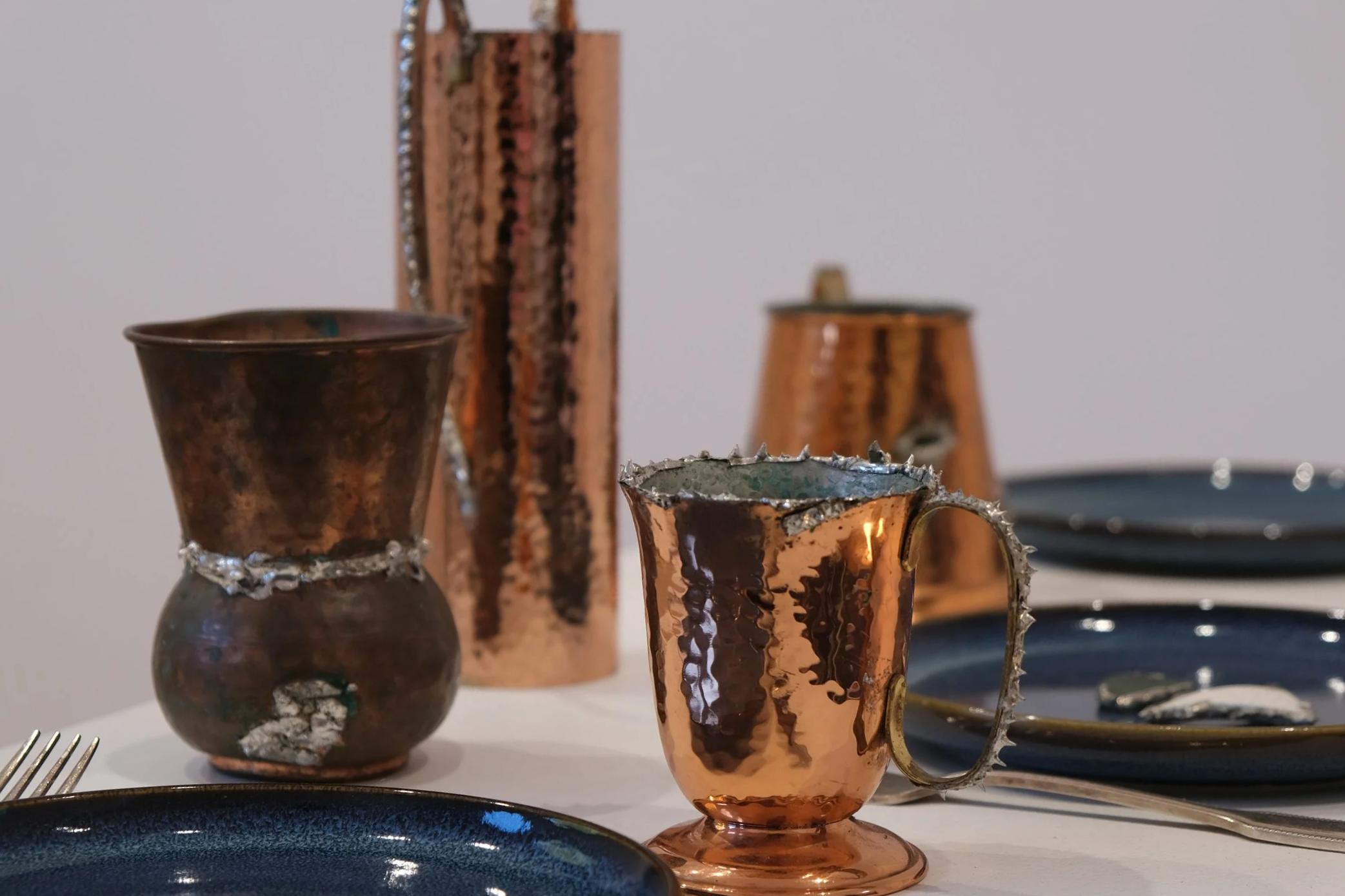 Settlement, Sam Kariotis