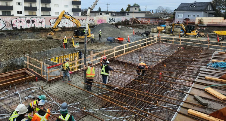Crew in high-visibility gear on site