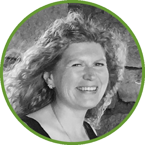 Sarah Otazo smiling with curly hair, black and white profile photo, green circular border.