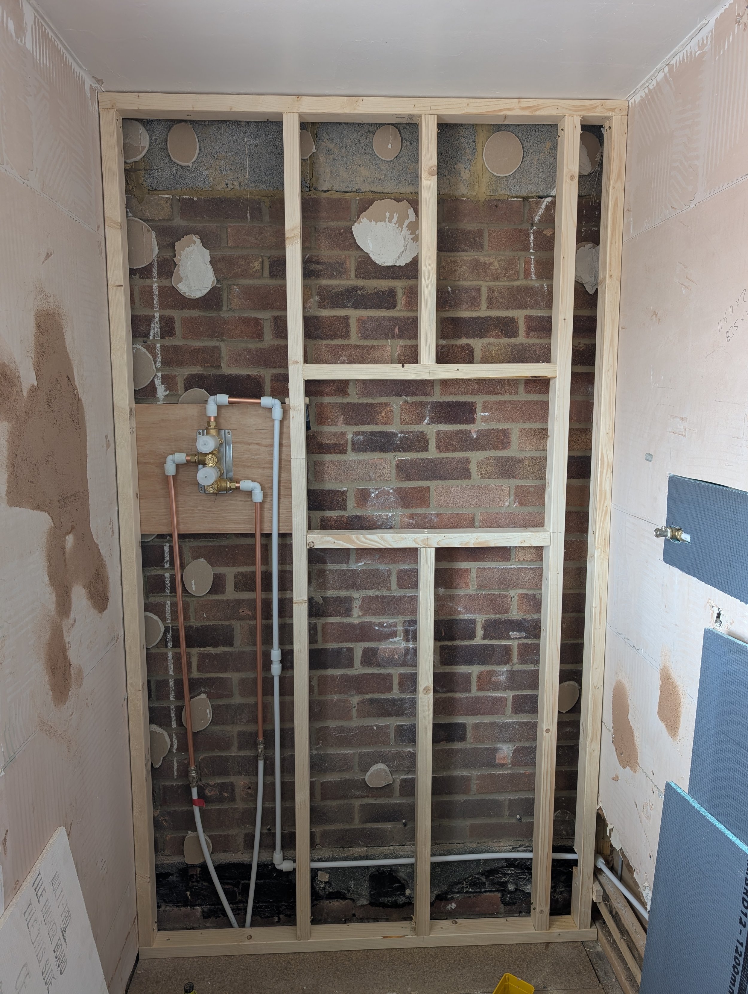 New wall built to allow for a niche and a concealed shower valve