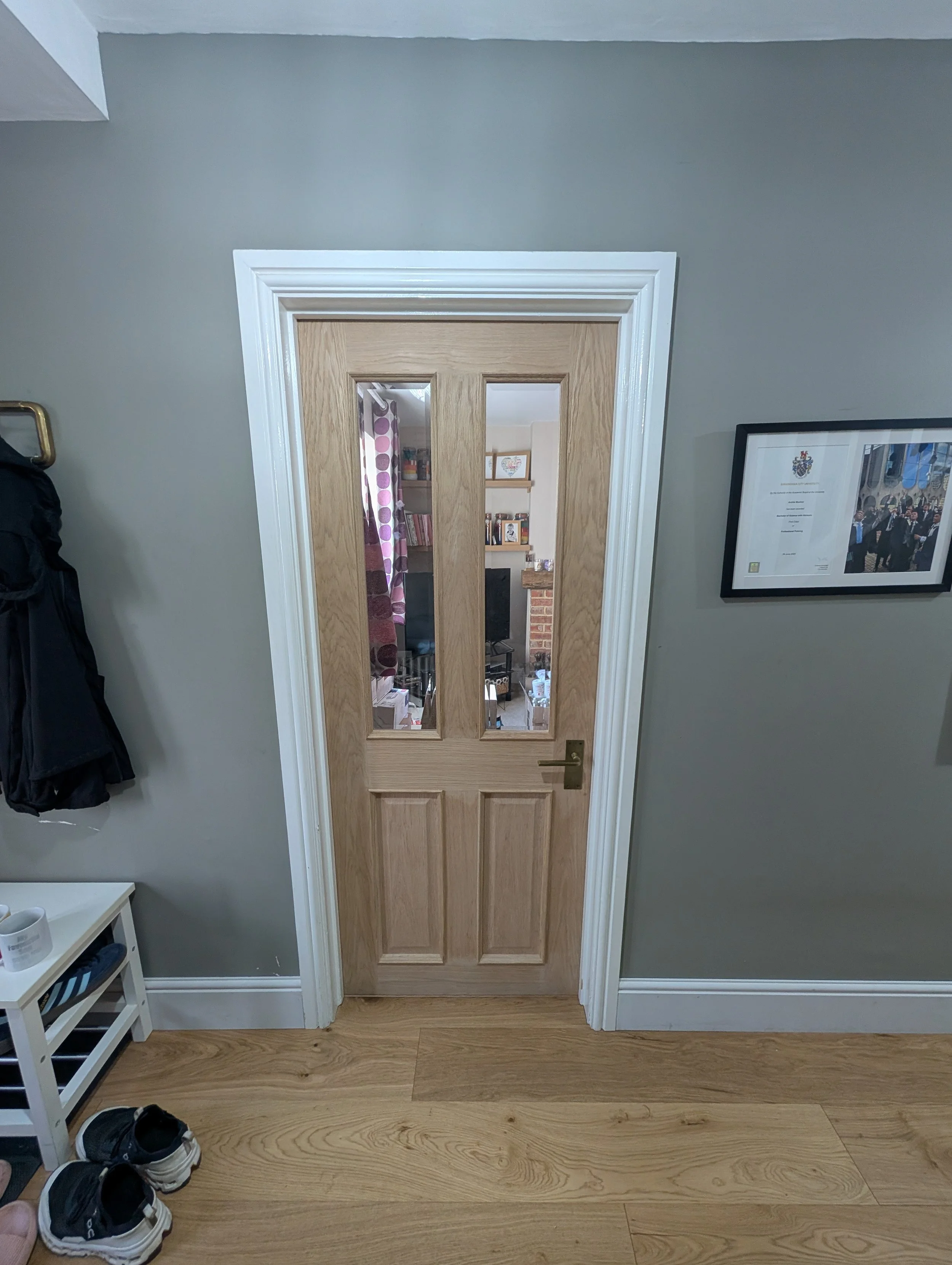 Oak doors installed with new ironmongery