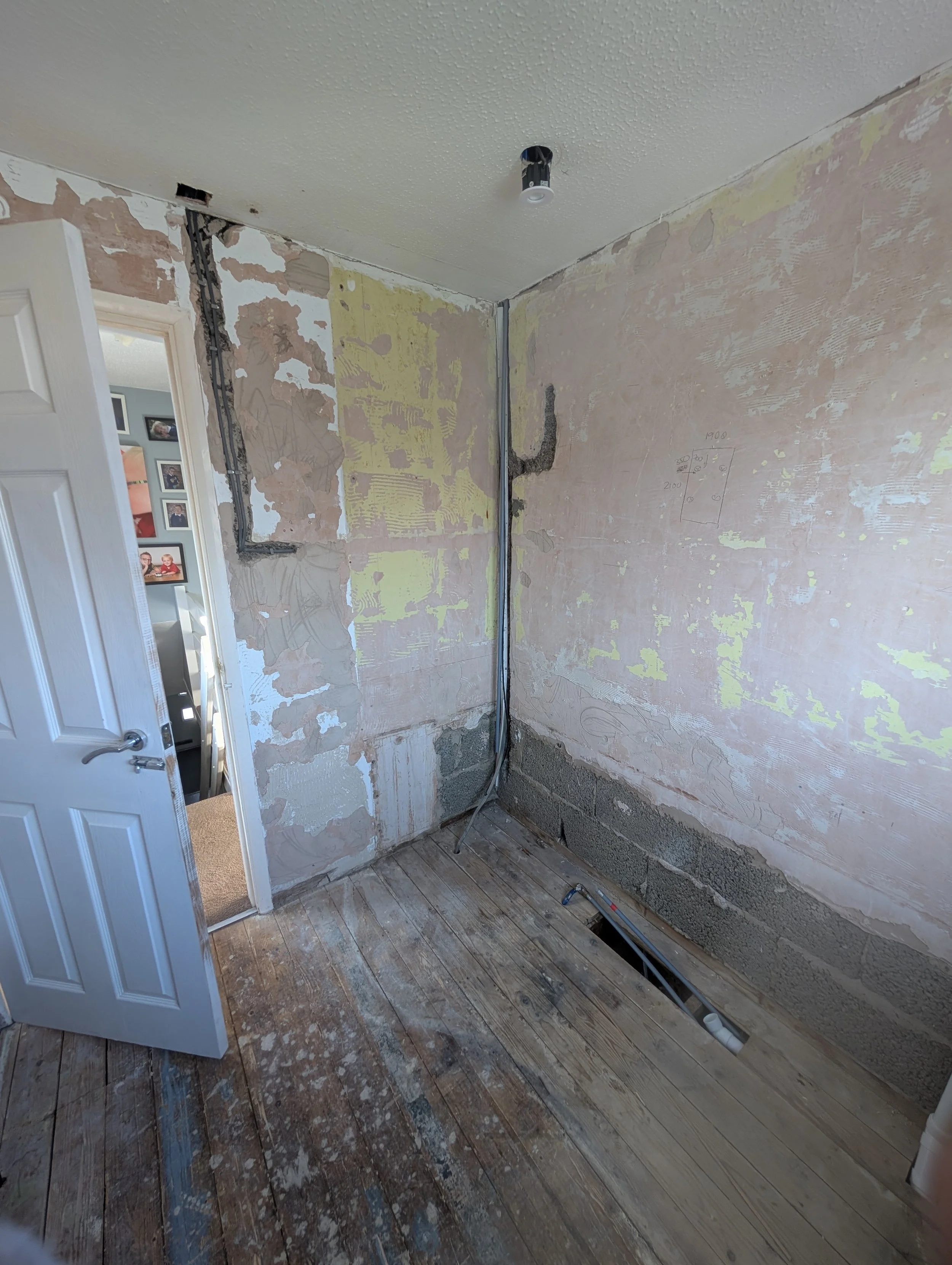 Full rip-out, back to bare bones to make the necessary pipework adjustments - new downlights also fitted