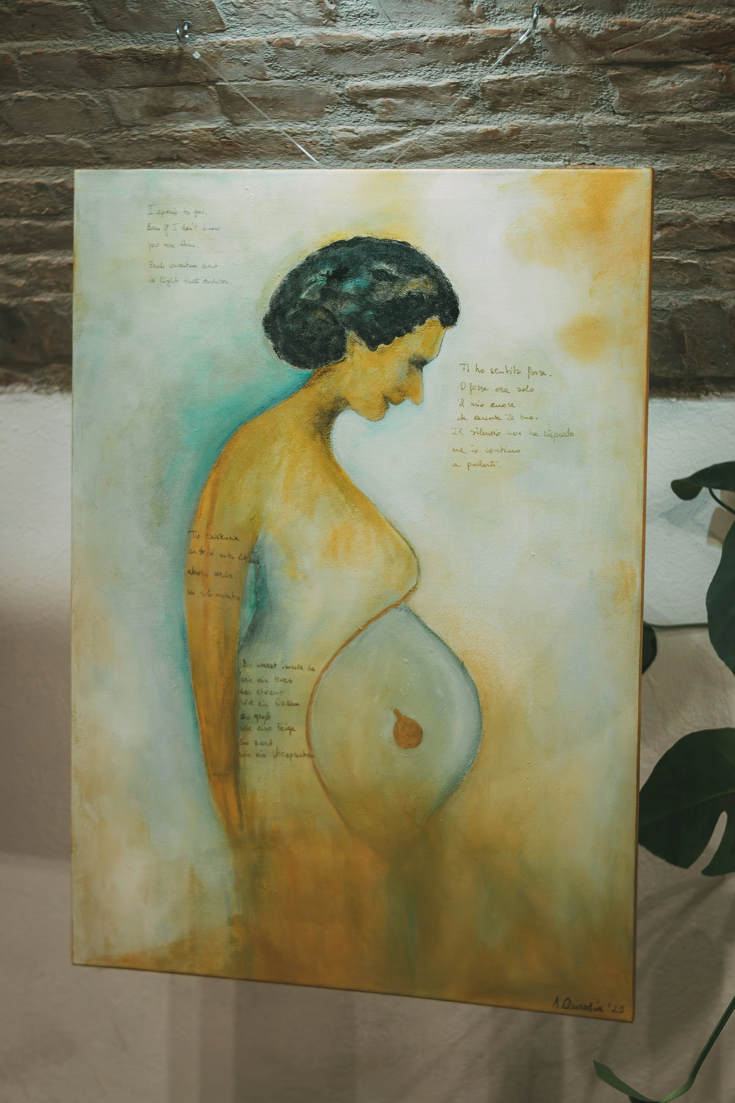 Painting of a pregnant woman with dark hair, looking downward, with handwritten text on the sides, against a soft, warm background.