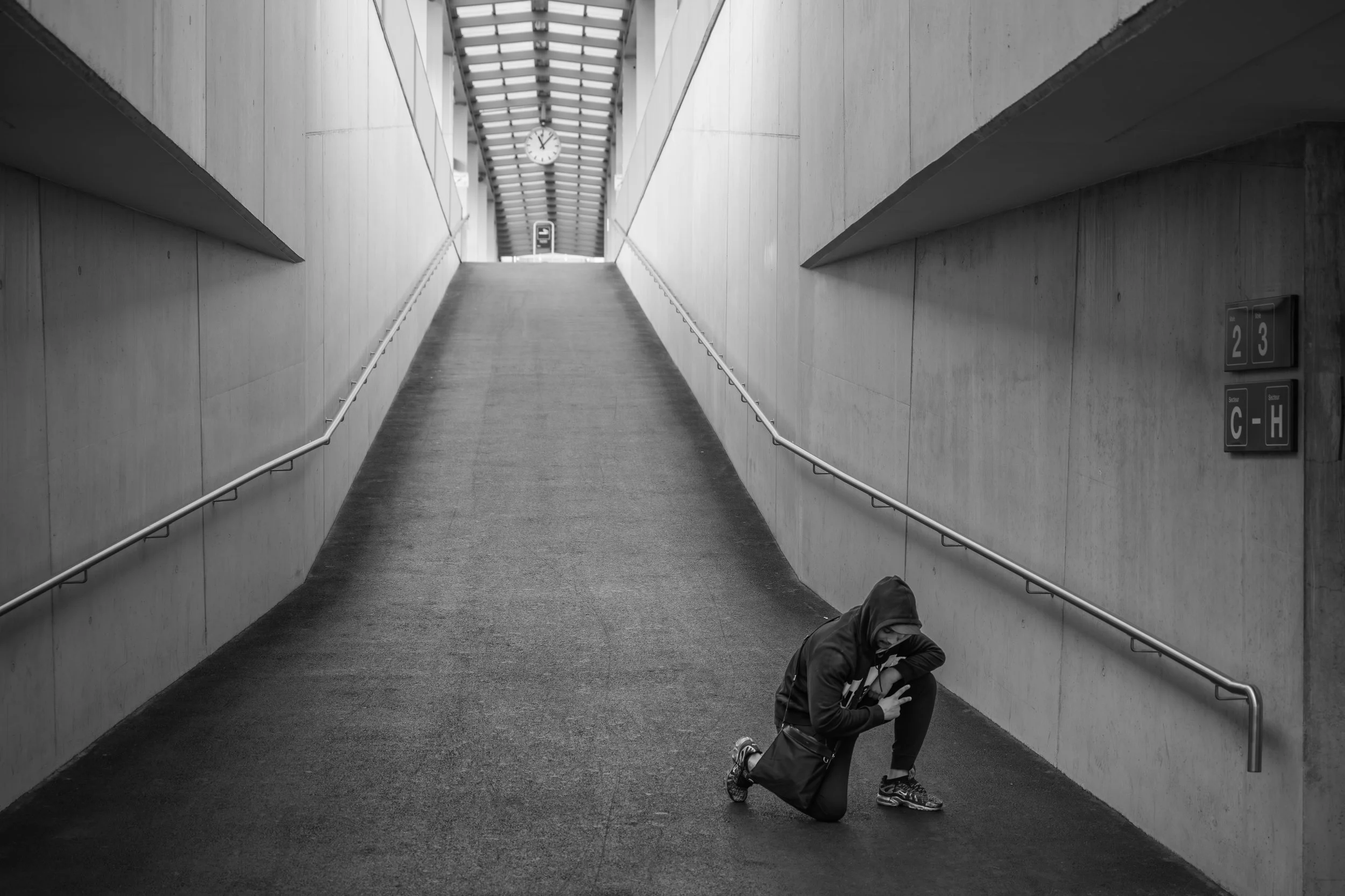 Teenager posing on a railway access ramp