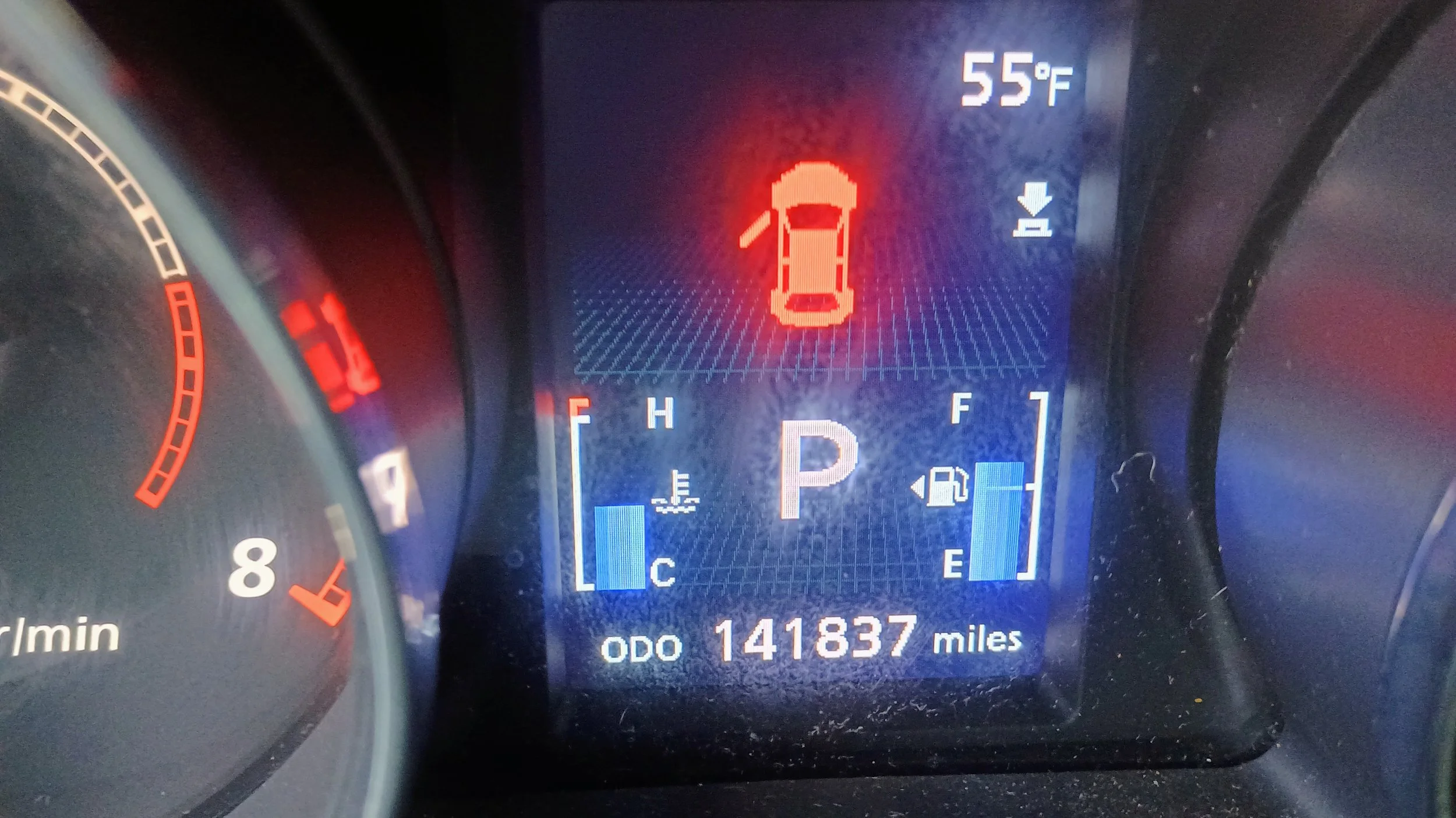 Car dashboard display showing a warning light indicating a door is open, temperature at 55°F, a fuel gauge near empty, and the odometer reading 141837 miles.