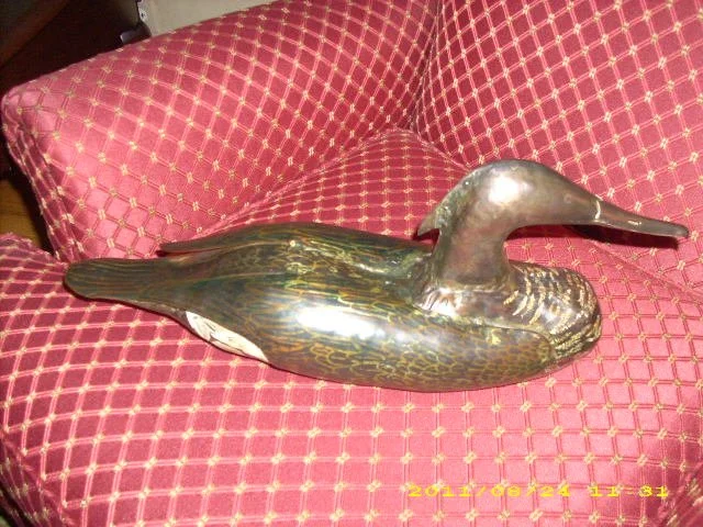 Merganser hen - Hand formed steel, bronze and copper sheet metal.