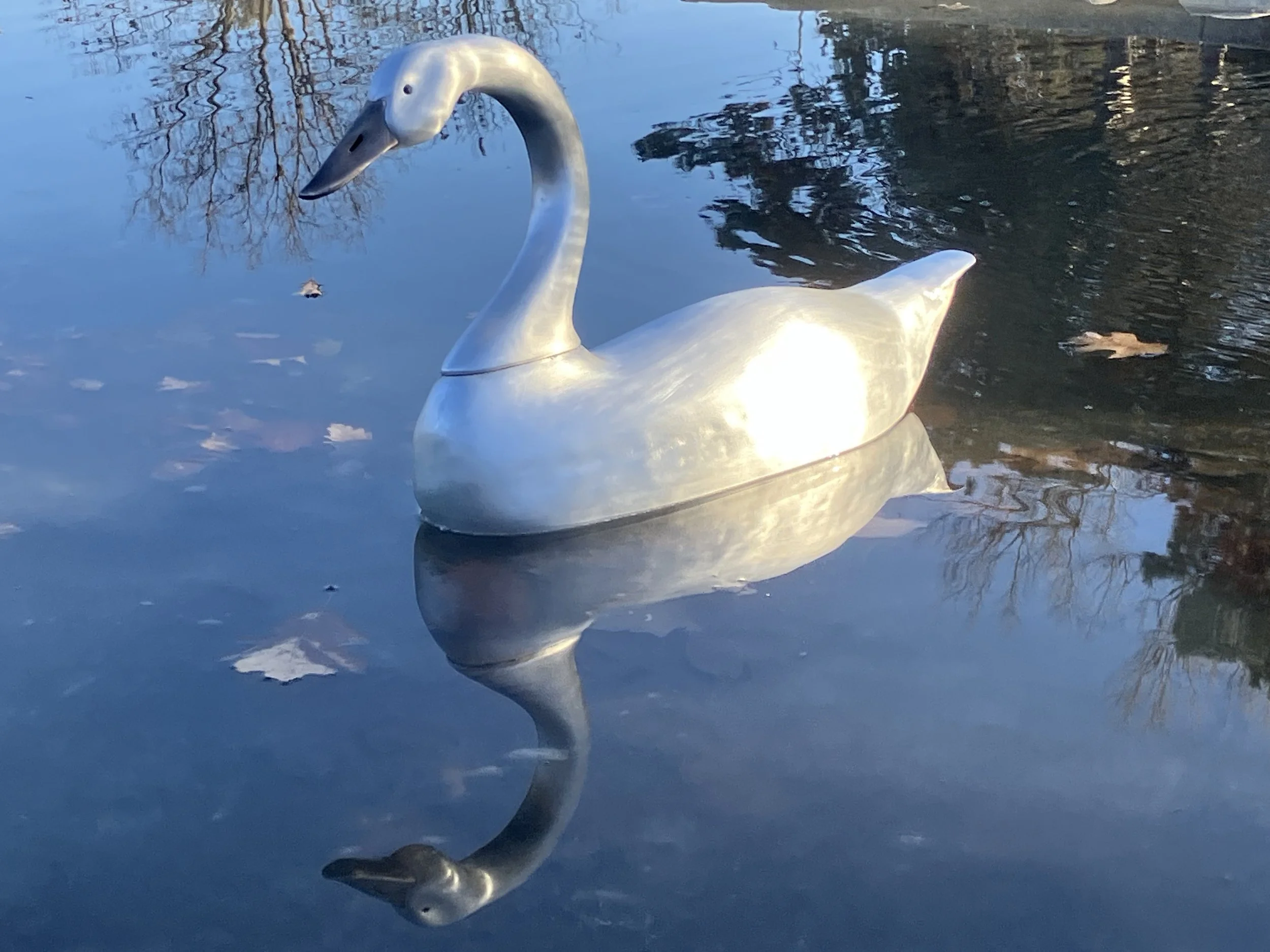 Swan - hand formed from .063 aluminum sheet metal. Done in the style of Maryland decoy carver John "Daddy" Holly (1818-1892).
