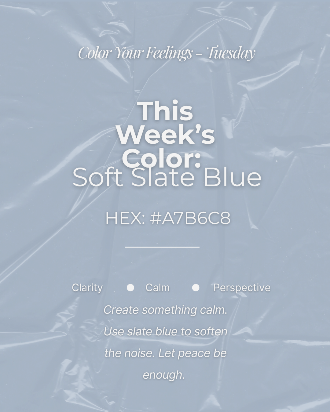 A digital art display with a light blue background and white text. It reads: "Color Your Feelings - Tuesday. This Week's Color: Soft Slate Blue. HEX: #A7B6C8. Clarity, Calm, Perspective. Create something calm. Use slate blue to soften the noise. Let peace be enough." The background appears to be a slightly crinkled or textured surface.