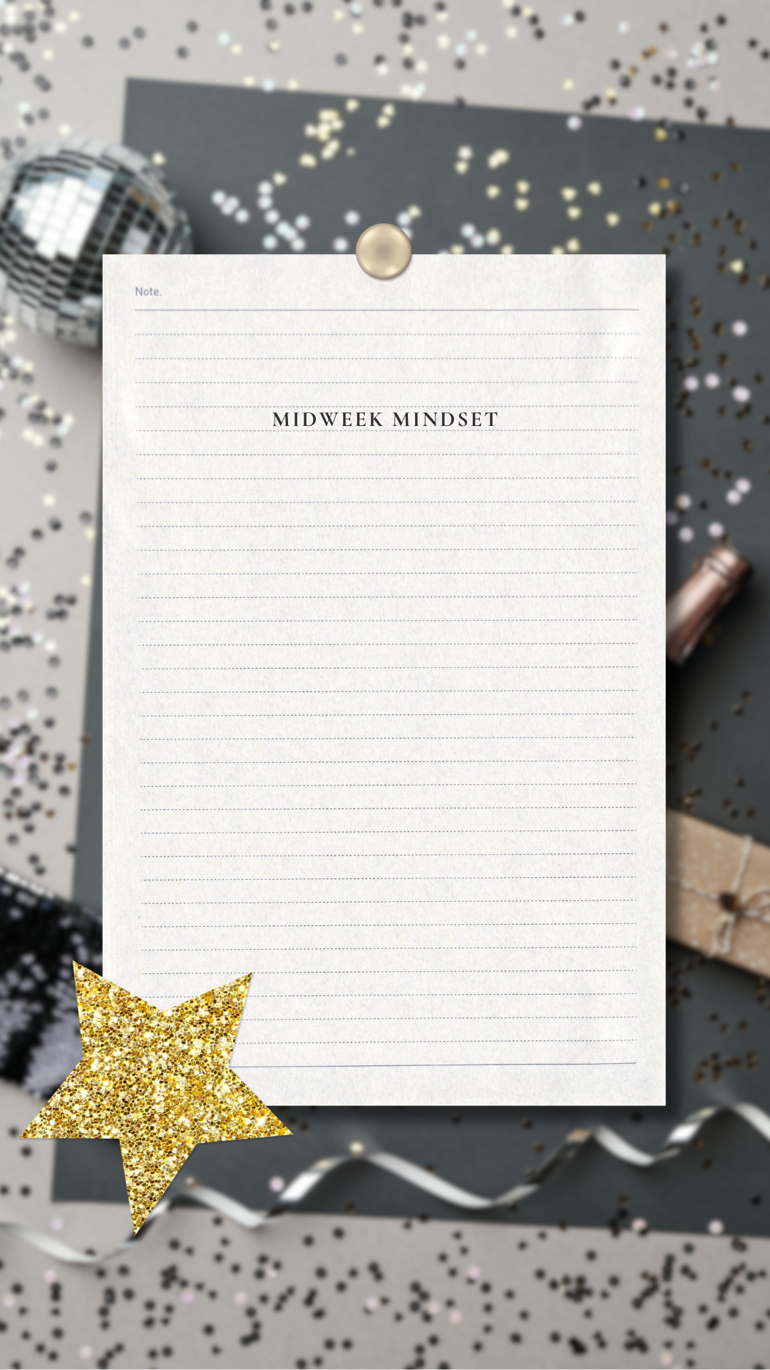 A notepad titled 'Midweek Mindset' with a gold star sticker and various party decorations, including a disco ball, confetti, a wrapped gift, and curling ribbon, on a festive tabletop.