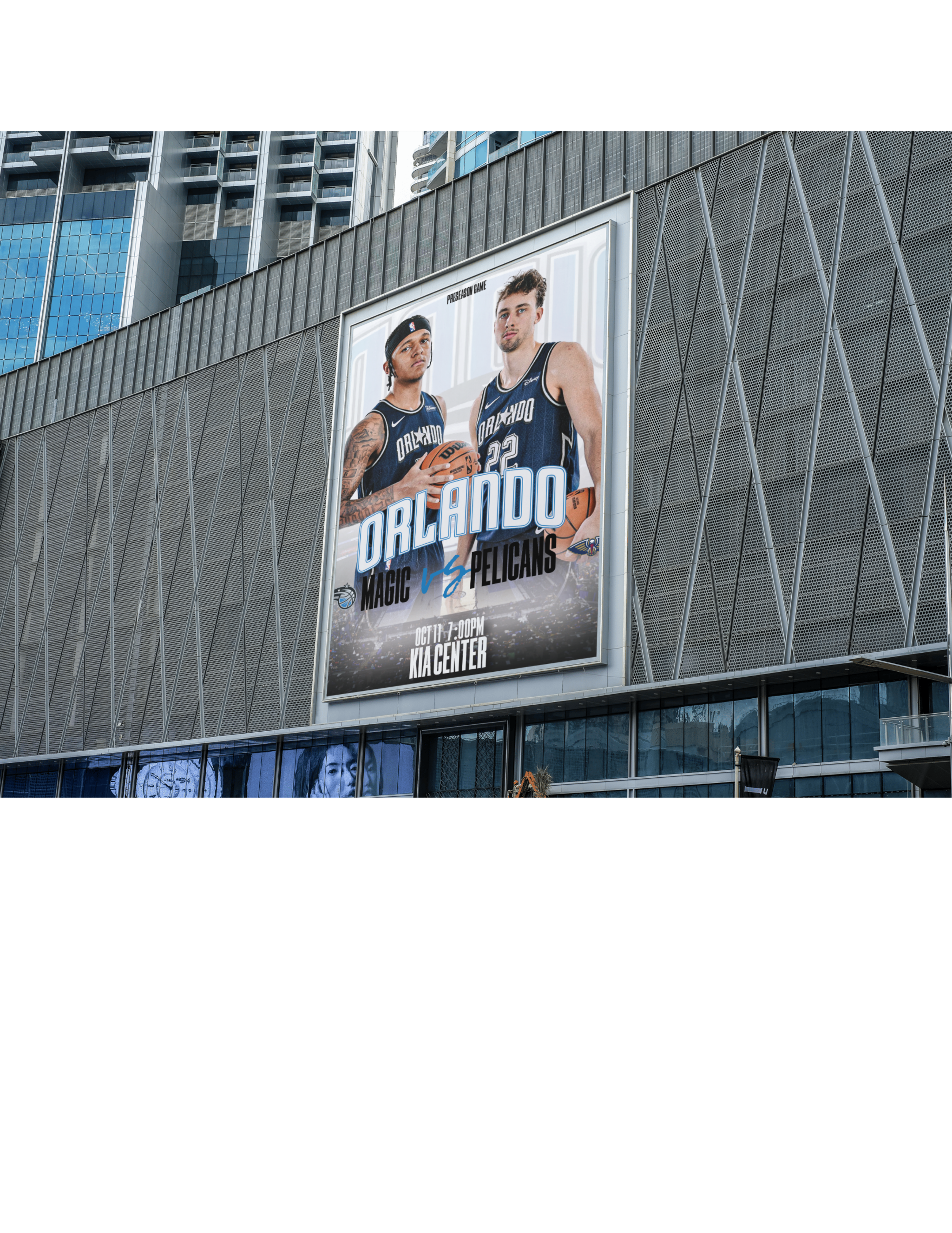 Outdoor billboard advertisement mockup promoting an Orlando Magic basketball game between the Magic and Pelicans, displayed on a large city building.