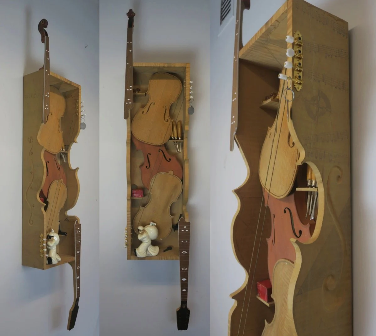 15 One Last Flower for Grandpa	Curly Maple and other Wood, Tuners, Guitar String, Resin, WWII Navy Dog Tag, Three Gouges, Ceramic Figurine, One Dollar Bill		
HWD 4.5x1x0.5 ft	2013
My grandfather was my gateway into woodworking. He was a fine craftsma