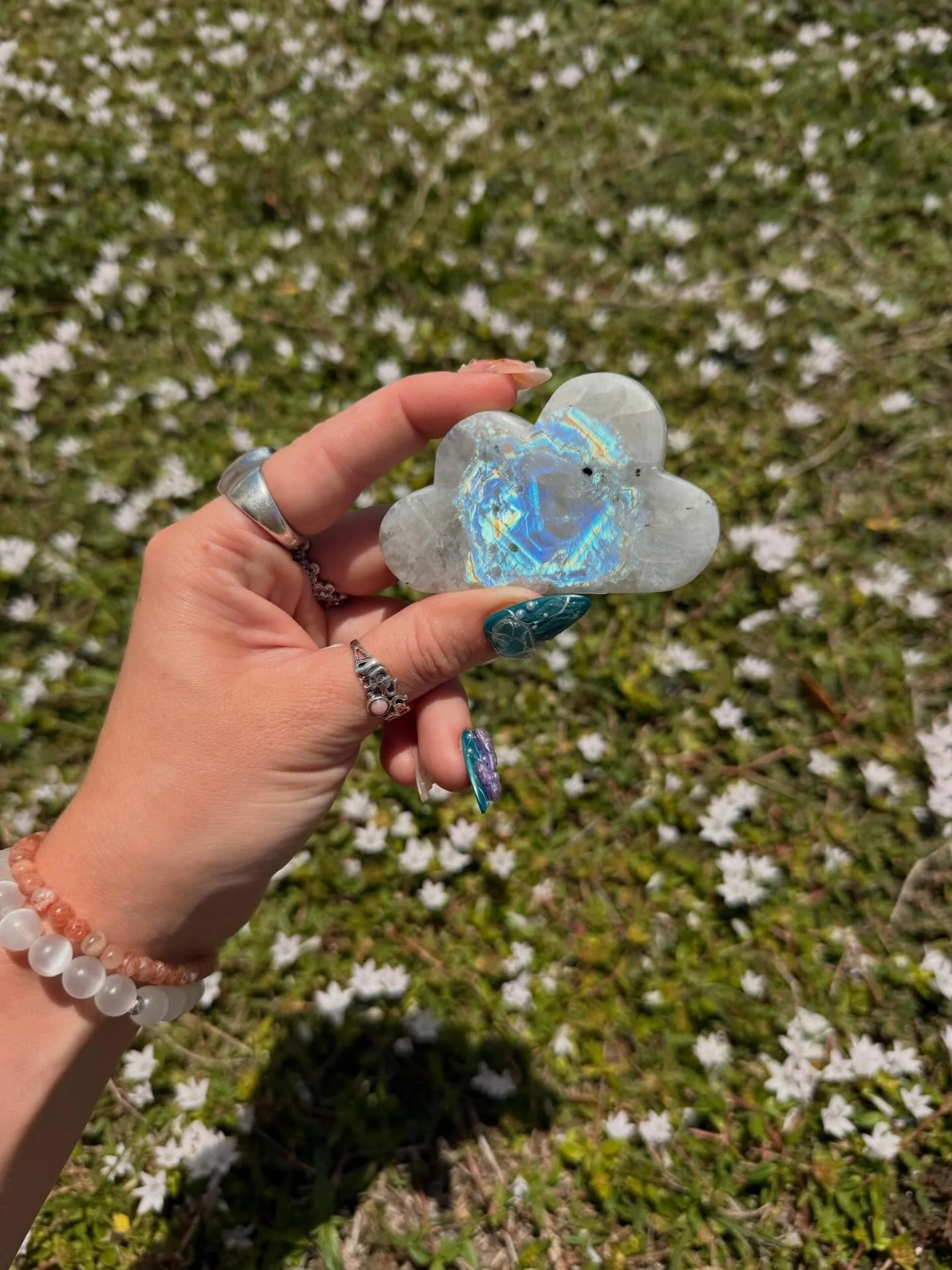 ✨ No filter. No edits. Just an absolutely breathtaking piece of Rainbow Moonstone. ✨

This dreamy cloud carving is flashing the most incredible crescent moon across its face, and the camera barely does it justice. 🌙💙

Rainbow Moonstone is known for