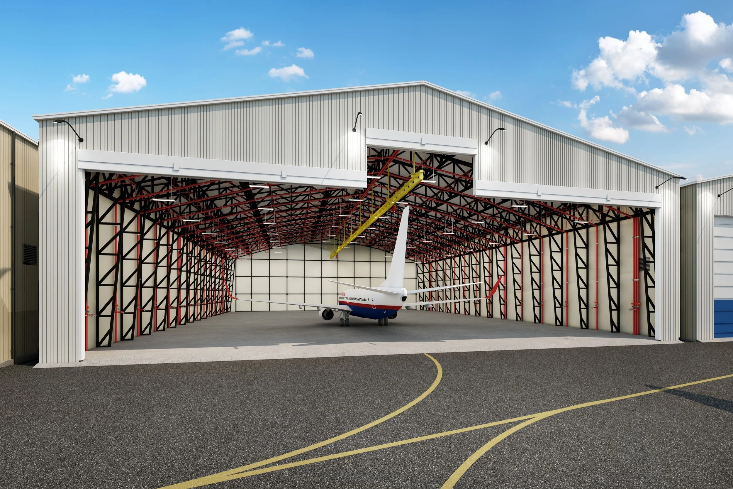 An airplane inside a large hangar with a high roof and open sliding door, showing the interior structure and a yellow overhead crane.