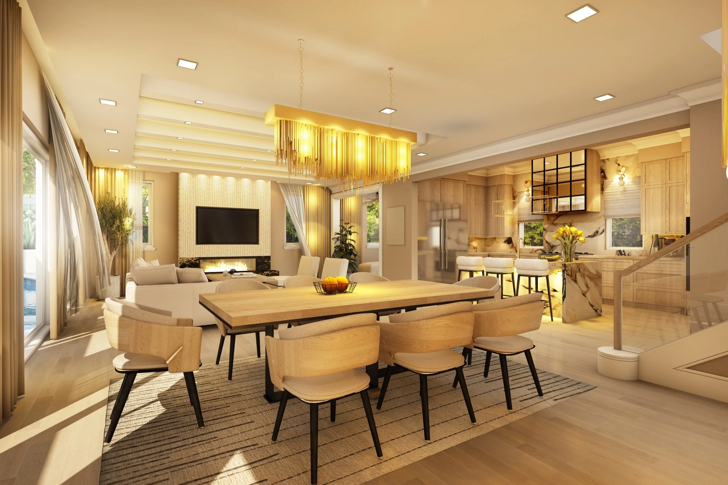 Open-concept living and dining area with light wood furniture, a large dining table, eat-in kitchen with bar stools, and a living room with a television and fireplace, all illuminated by windows and a large golden chandelier.