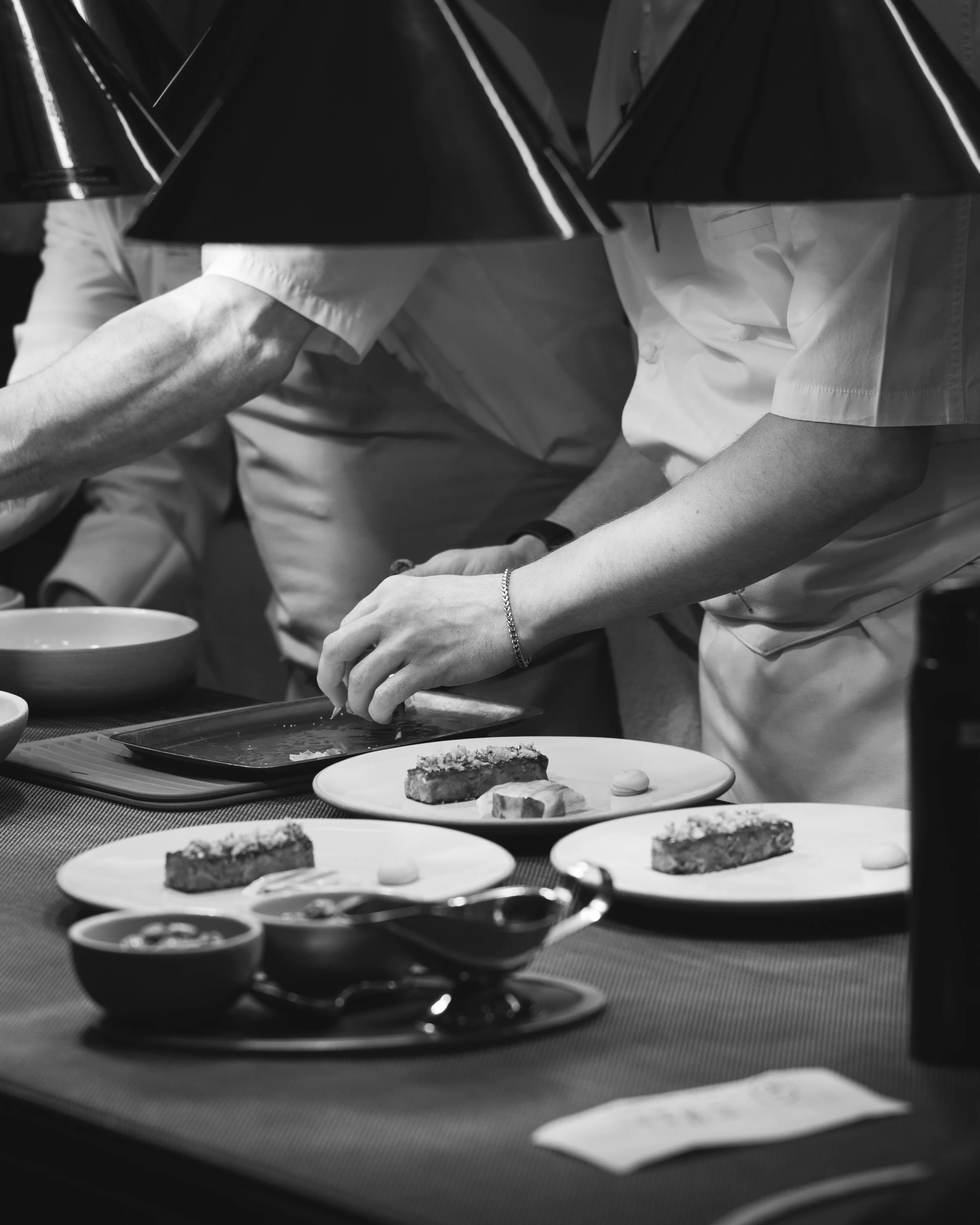 Kitchen shots for guest chef collaboration with Sean Brock at Daniel Humm x The Charleston Place popup powered by Resy. Food and lifestyle photography for Daniel Humm x The Charleston Place in Charleston, South Carolina.

Studio Lou is a food, restau