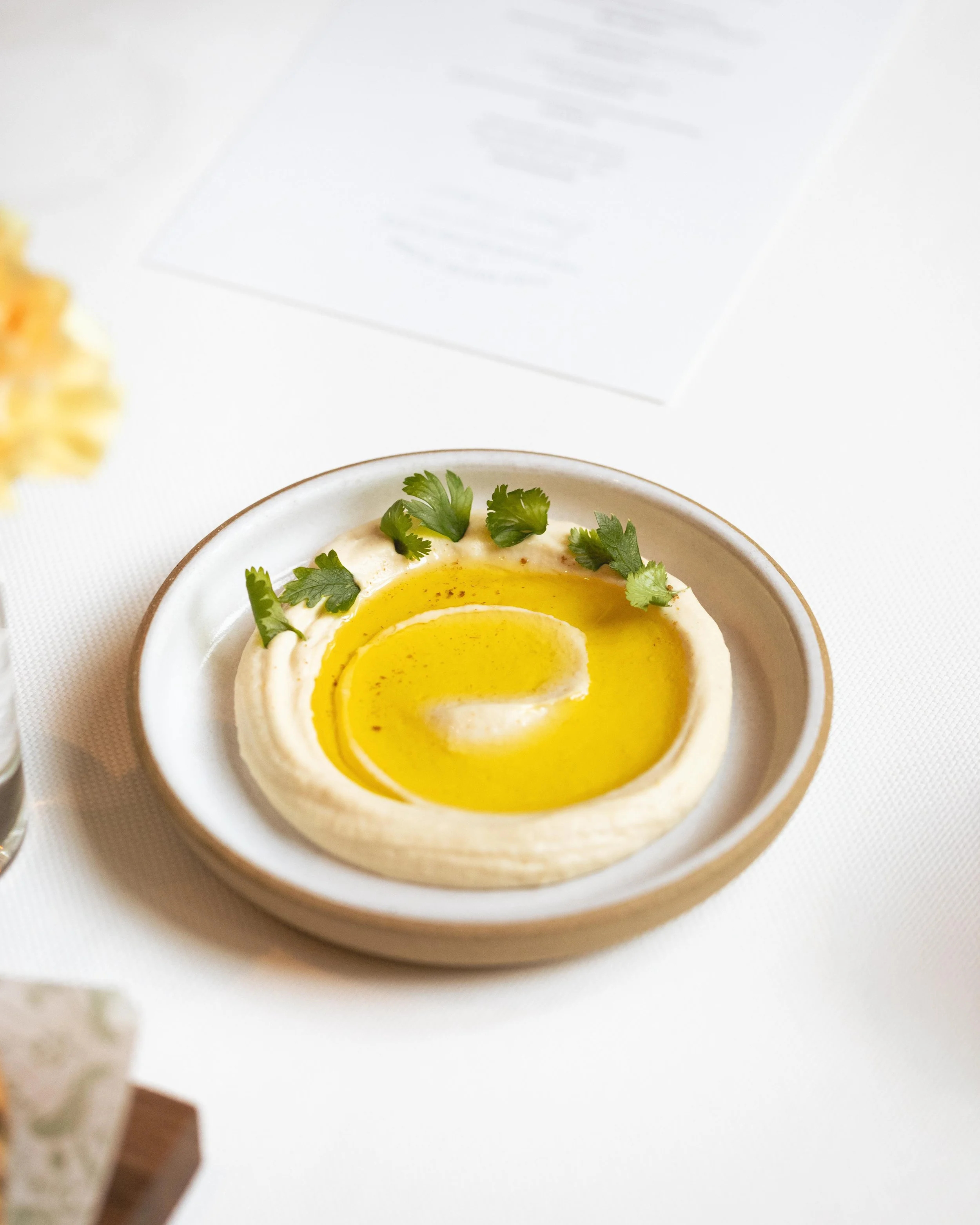 Chef Daniel 'Dano' Heinze of Vern's at Daniel Humm x The Charleston Place popup guest chef series powered by Resy. Food and lifestyle photography for Daniel Humm x The Charleston Place in Charleston, South Carolina.

Studio Lou provides food and beve