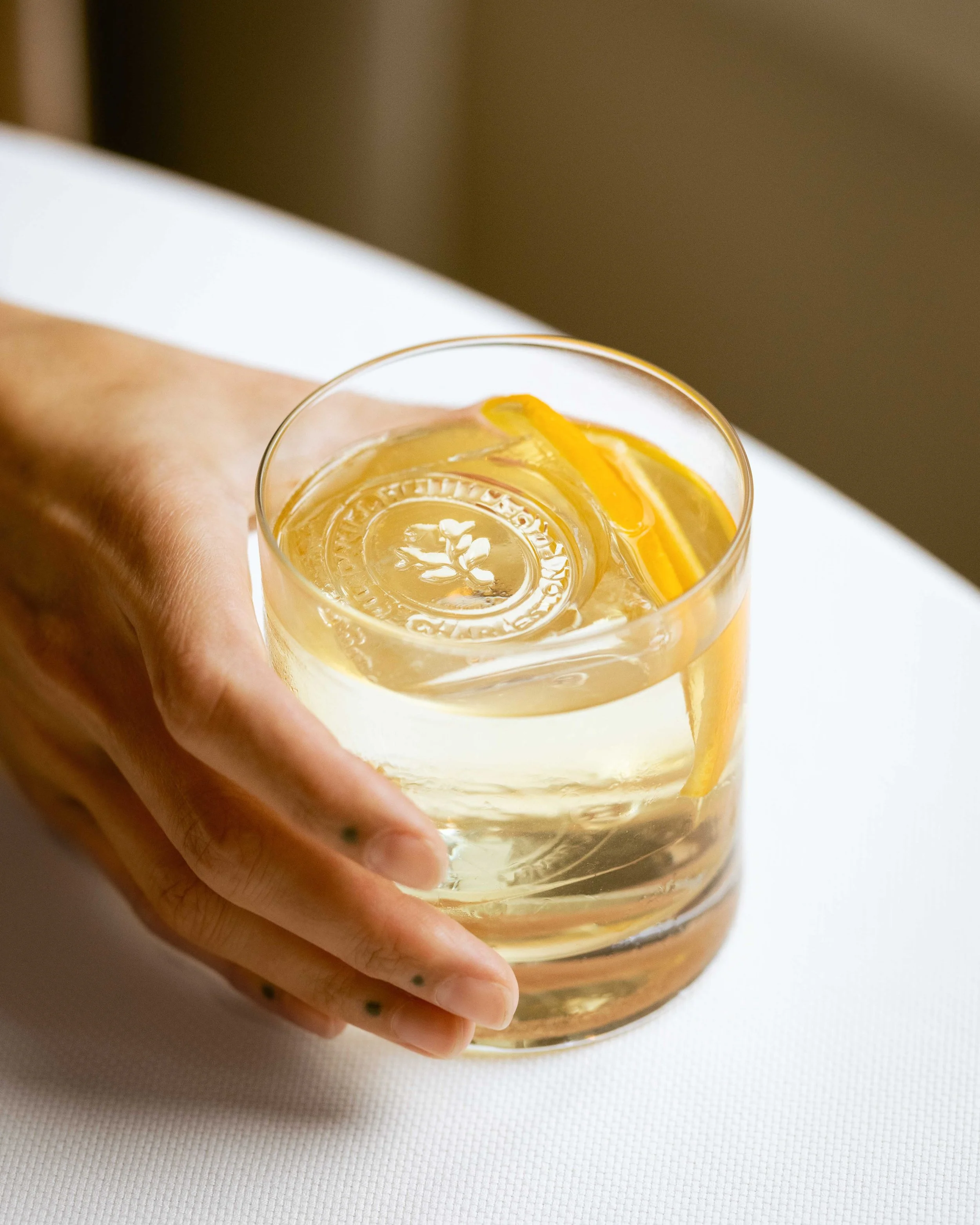 Cocktail at Daniel Humm x The Charleston Place restaurant powered by Amex and Resy in Charleston South Carolina.

Studio Lou provides food and beverage photography, fine dining photography, restaurant photography, interior photography, art photograph