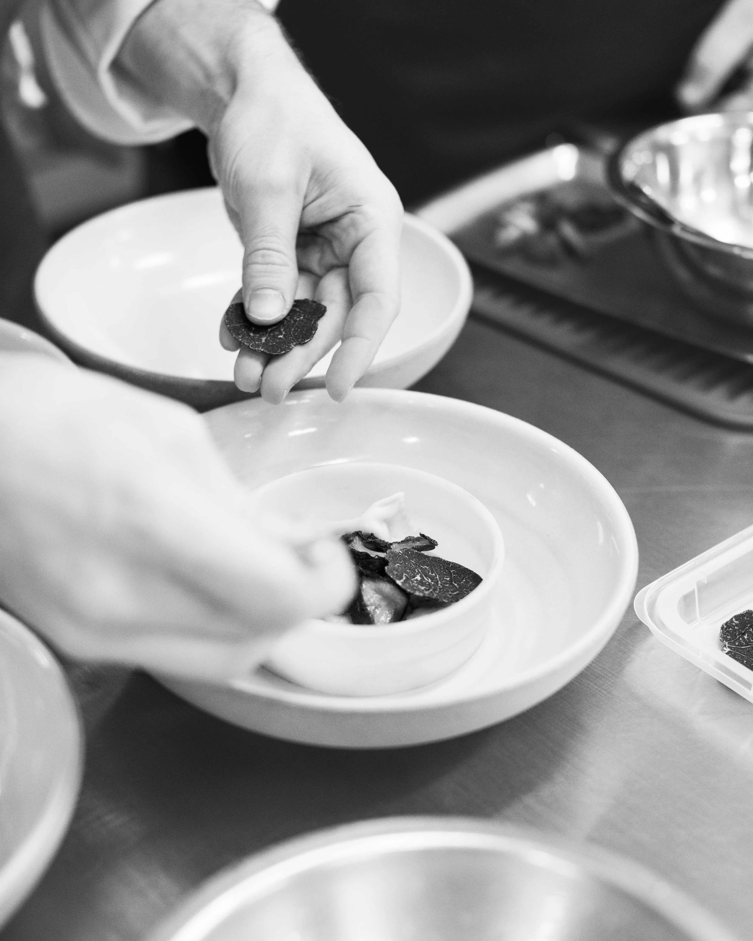 Kitchen shots for guest chef collaboration with Sean Brock at Daniel Humm x The Charleston Place popup powered by Resy. Food and lifestyle photography for Daniel Humm x The Charleston Place in Charleston, South Carolina.

Studio Lou is a food, restau