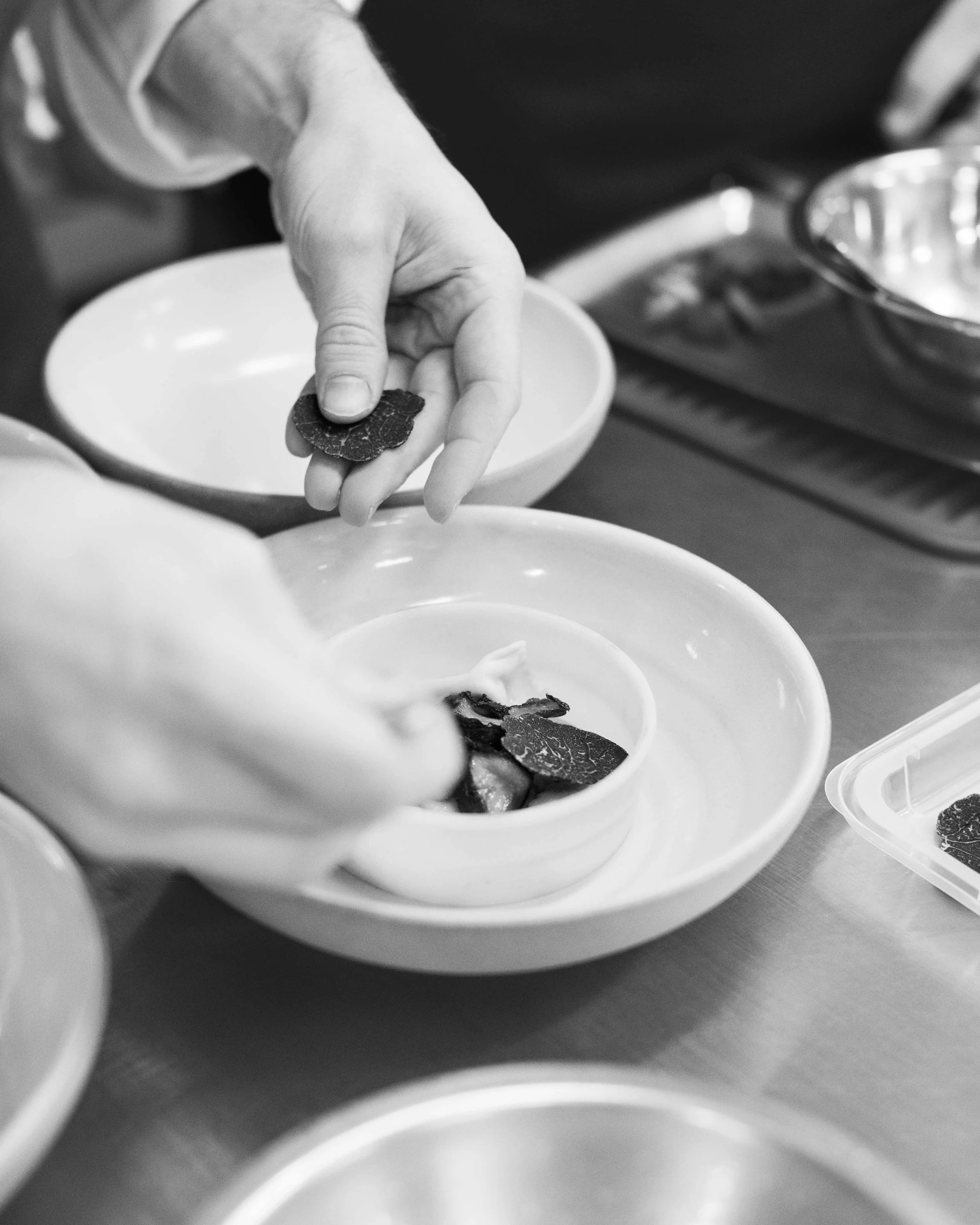 Kitchen shots for guest chef collaboration with Sean Brock at Daniel Humm x The Charleston Place popup powered by Resy. Food and lifestyle photography for Daniel Humm x The Charleston Place in Charleston, South Carolina.

Studio Lou is a food, restau