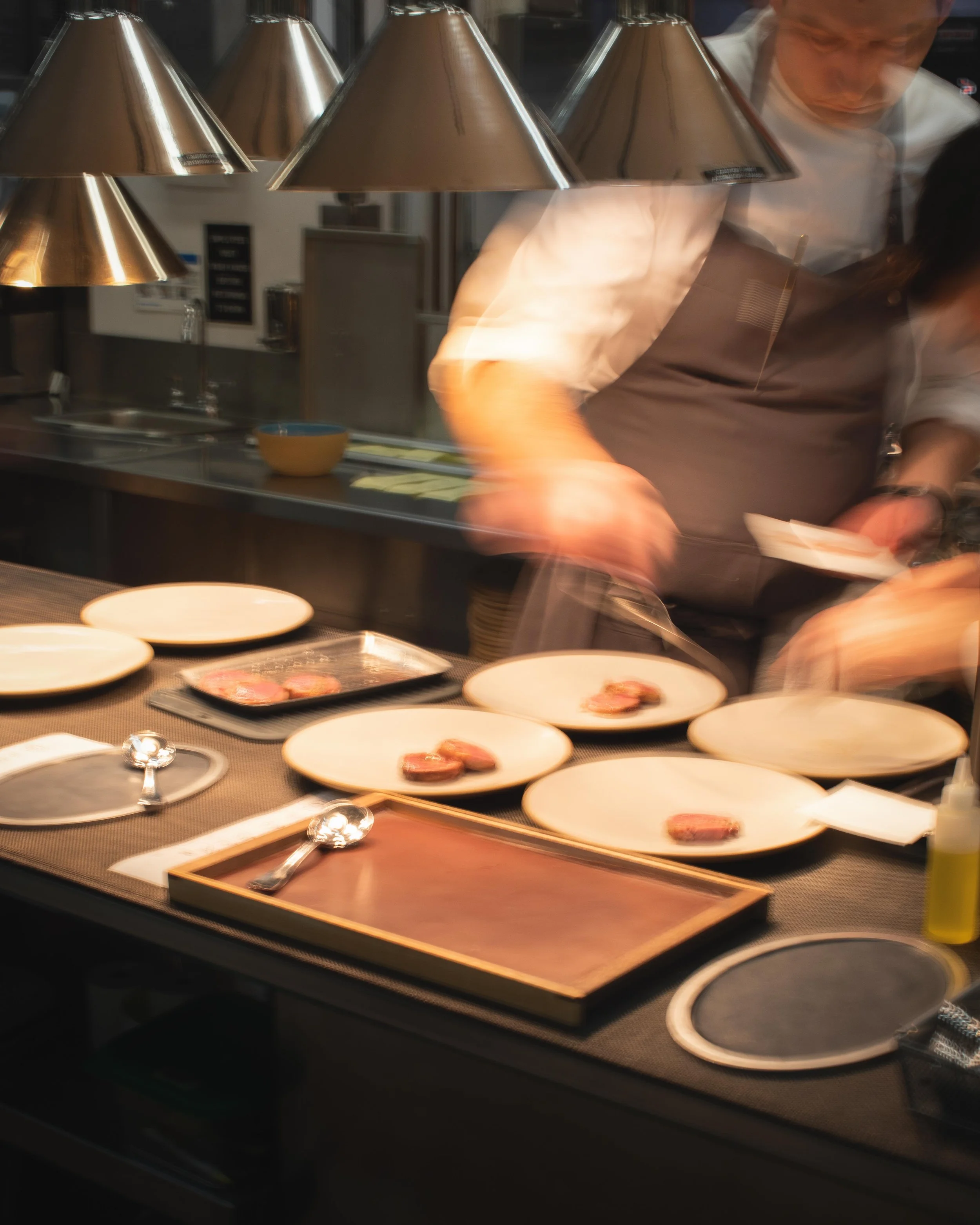 Kitchen shots for guest chef collaboration with James London of Chubby Fish at Daniel Humm x The Charleston Place popup powered by Resy. Food and lifestyle photography for Daniel Humm x The Charleston Place in Charleston, South Carolina.

Studio Lou 