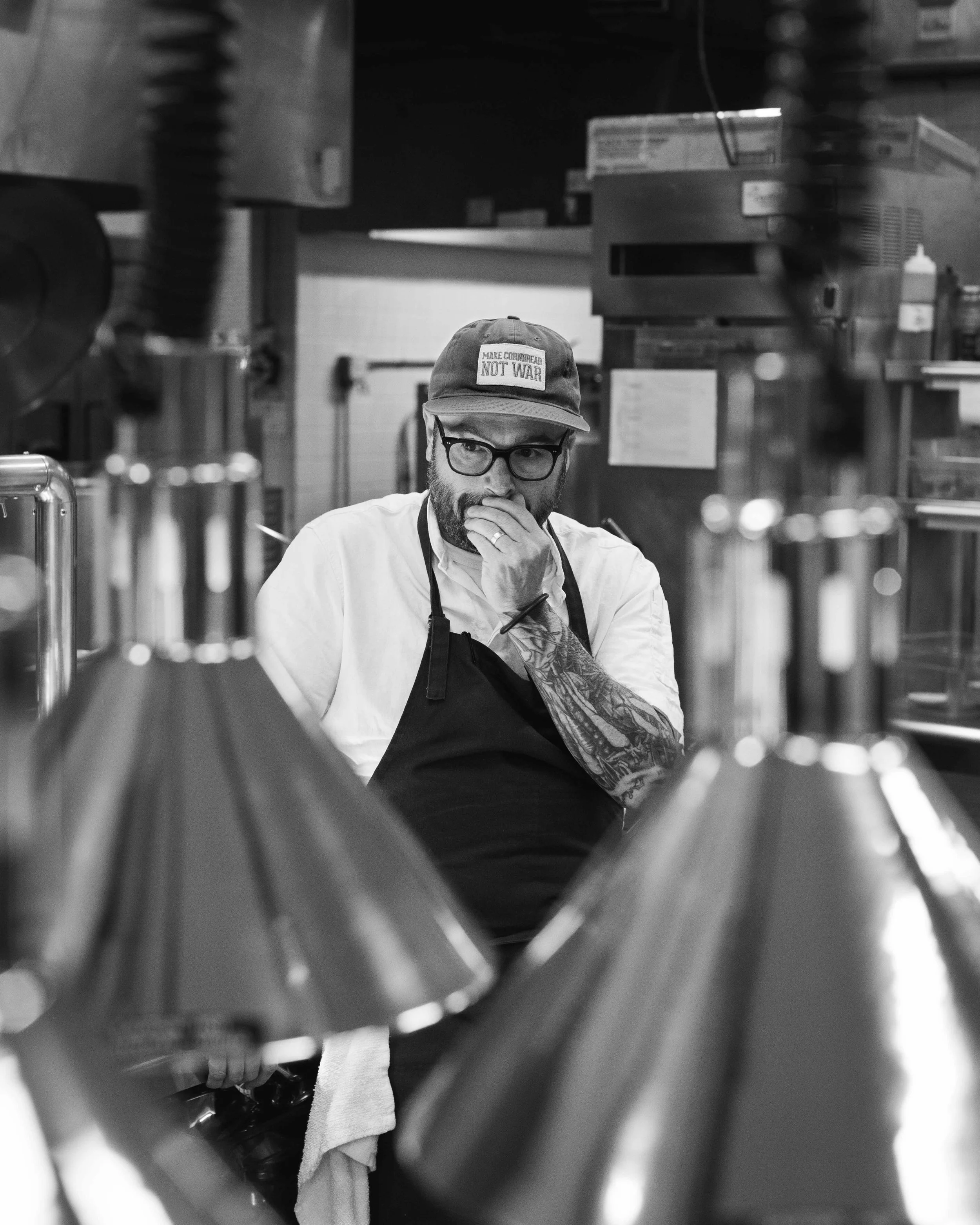 Chef Sean Brock in the kitchen for guest chef collaboration at Daniel Humm x The Charleston Place popup powered by Resy. Food and lifestyle photography for Daniel Humm x The Charleston Place in Charleston, South Carolina.

Studio Lou is a food, resta