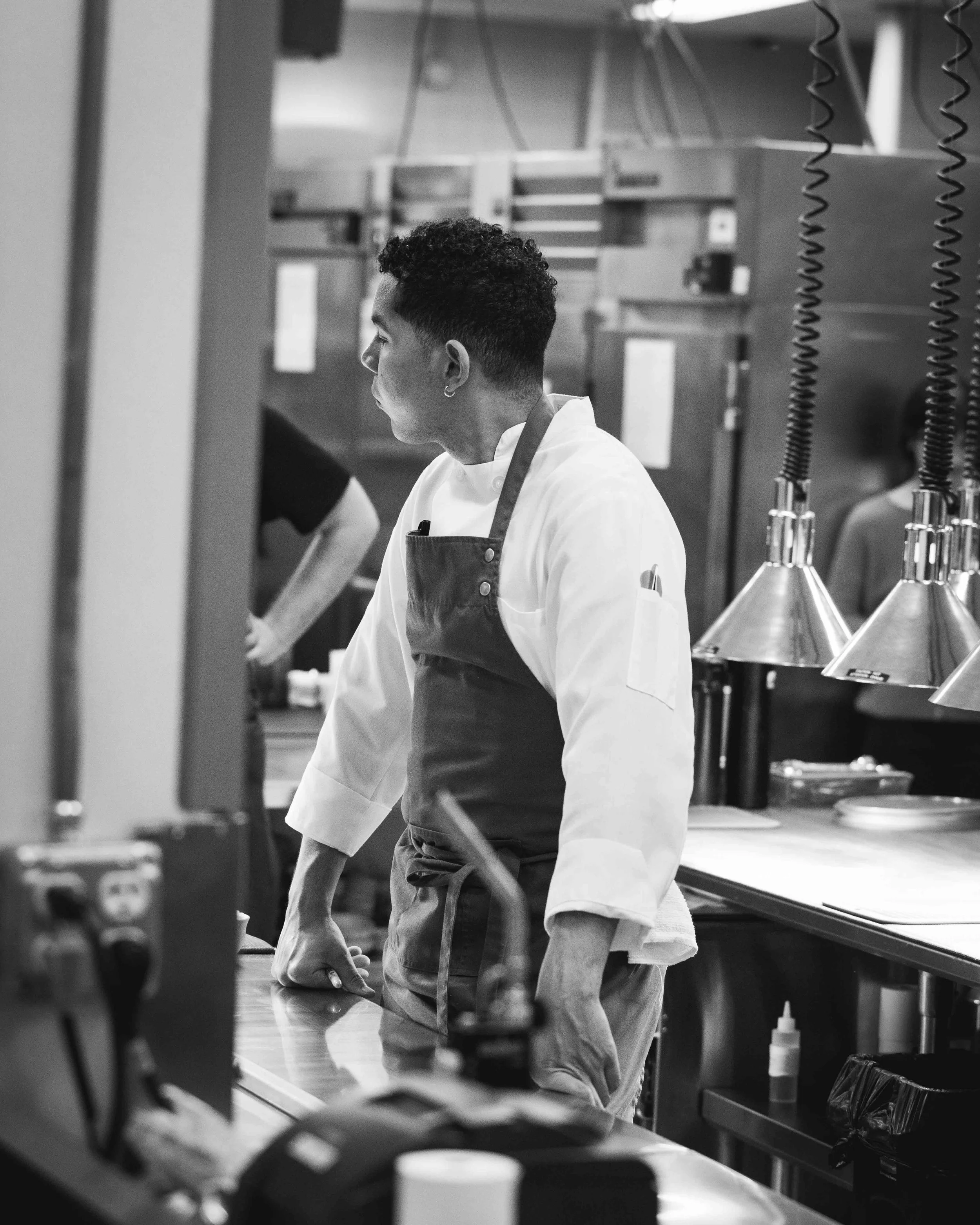 Chef Alex Pena in the kitchen at Daniel Humm x The Charleston Place in Charleston South Carolina.

Studio Lou provides food and beverage photography, fine dining photography, restaurant photography, interior photography, art photography, luxury food 
