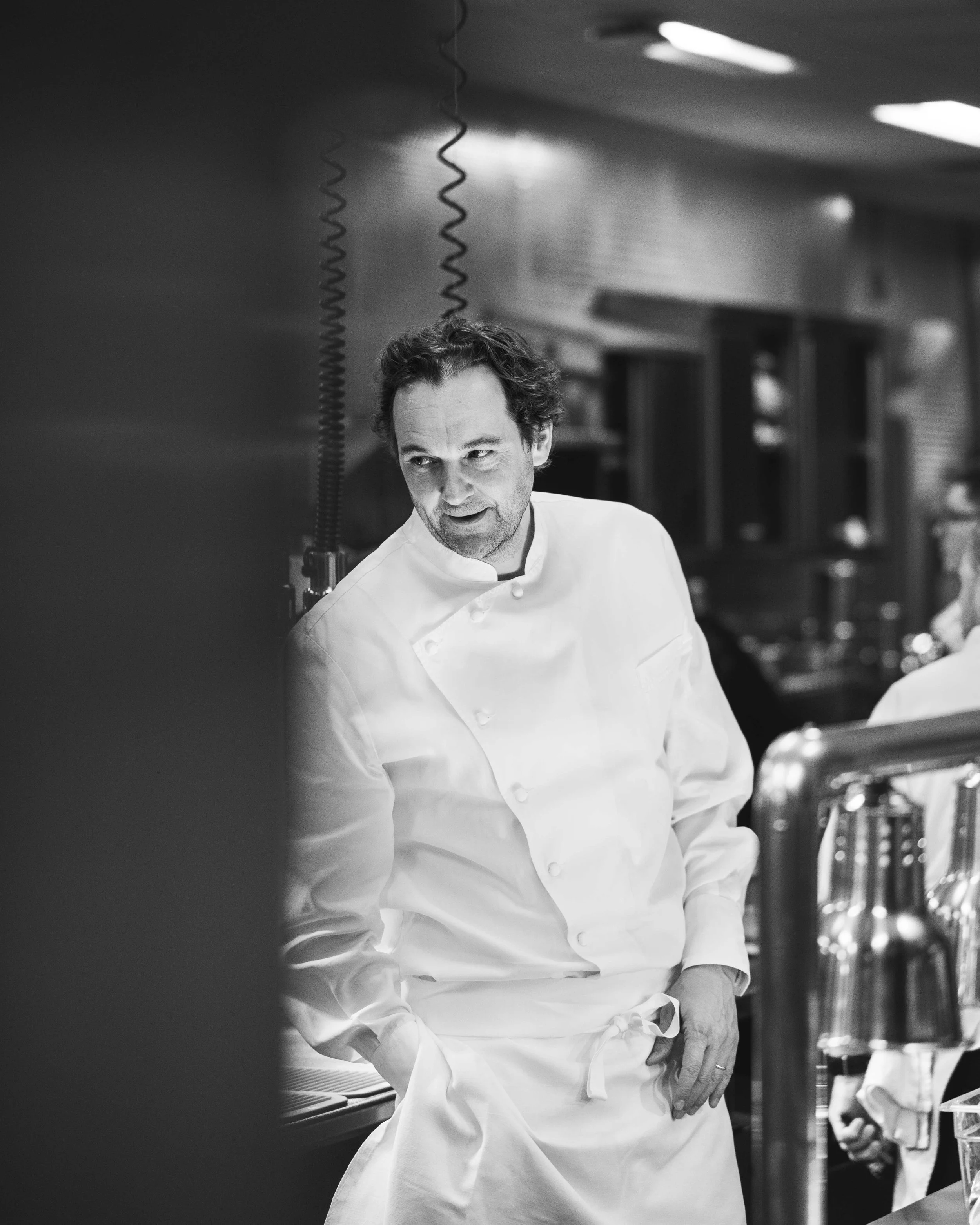 Chef Daniel Humm in the kitchen for guest chef collaboration with Sean Brock at Daniel Humm x The Charleston Place popup powered by Resy. Food and lifestyle photography for Daniel Humm x The Charleston Place in Charleston, South Carolina.

Studio Lou