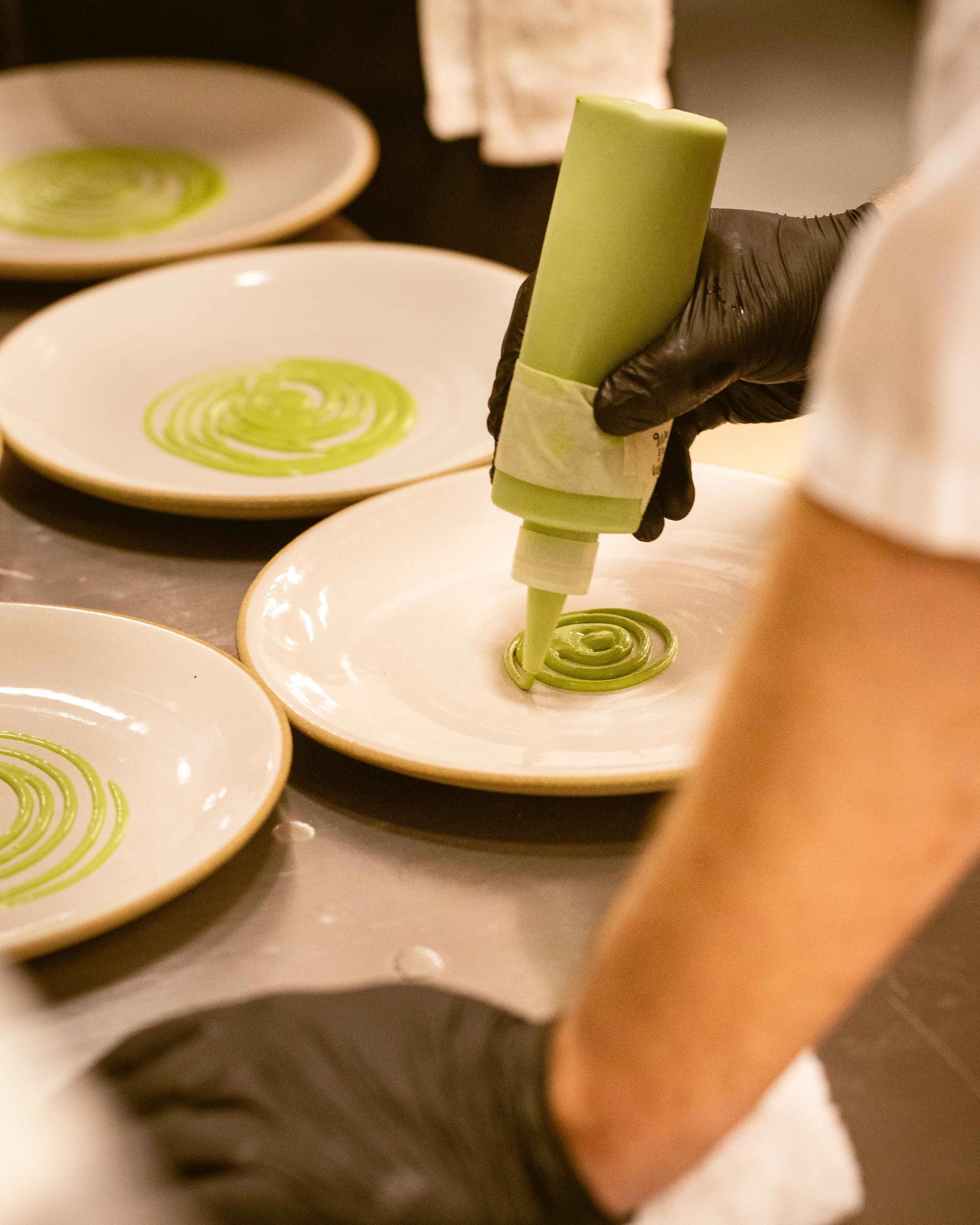 Kitchen scenes from the Chef Daniel 'Dano' Heinze of Vern's guest chef series for Daniel Humm x The Charleston Place restaurant pop-up powered by Amex and Resy

Studio Lou provides food and beverage photography, fine dining photography, restaurant ph