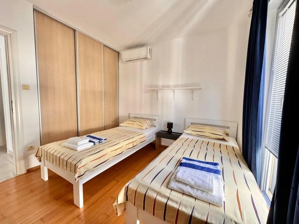 2-bedroom 2-bathroom apartment | Sea views of Bay of Kotor | Fully furnished | Dedicated parking space | Complex includes a large pool | €250,000 (AU$415,000)