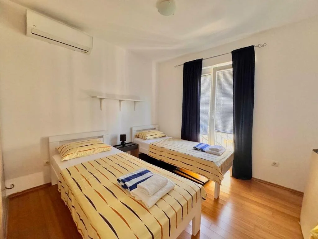 2-bedroom 2-bathroom apartment | Sea views of Bay of Kotor | Fully furnished | Dedicated parking space | Complex includes a large pool | €250,000 (AU$415,000)