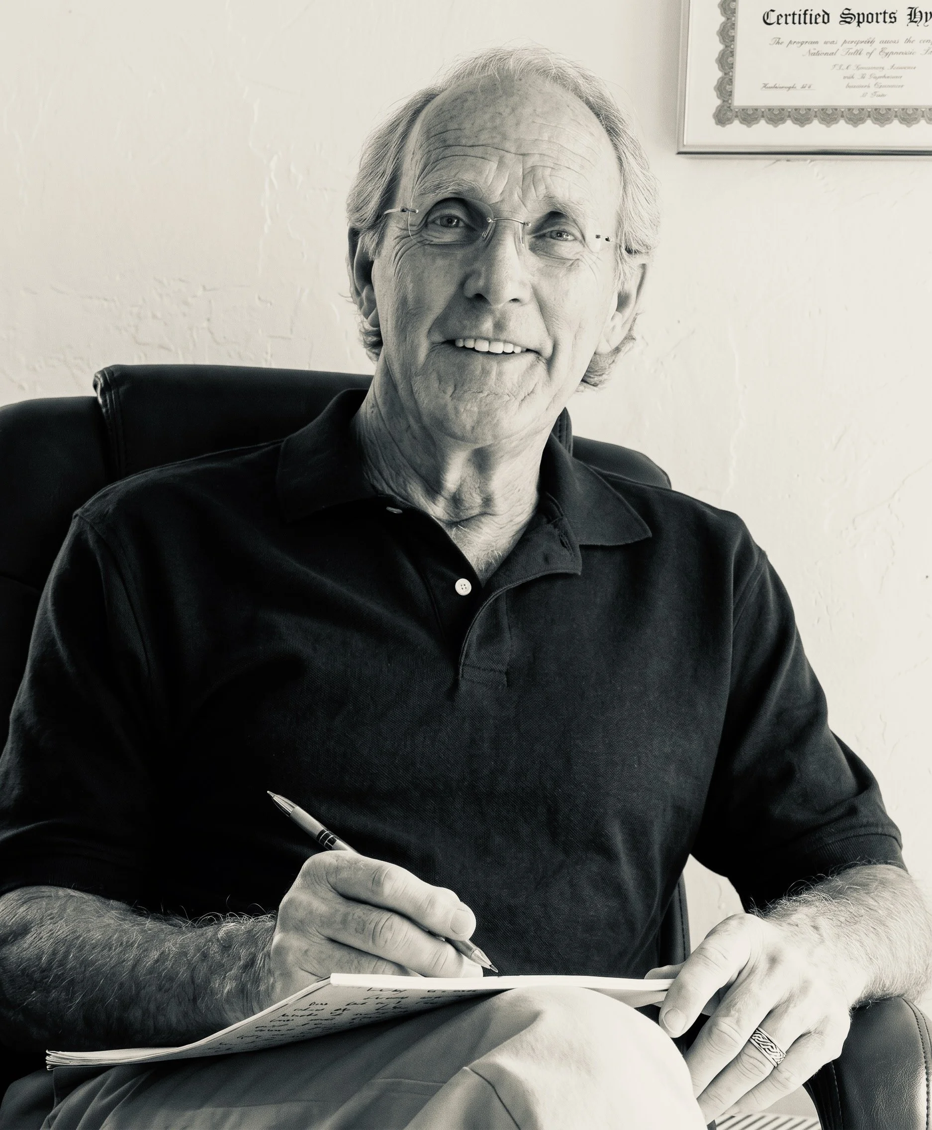 Older Gentleman writing a review