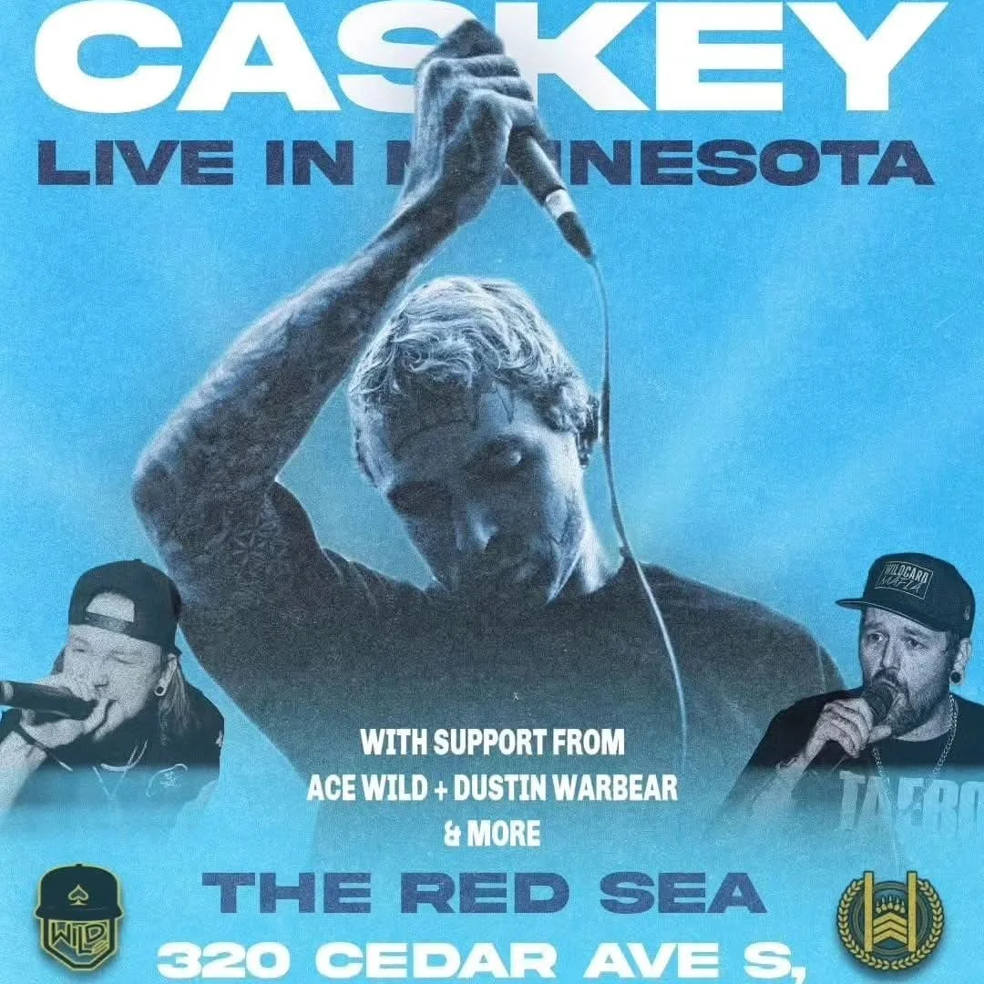 Concert poster featuring a male singer with tattoos holding a microphone above his head, with support acts Ace Wild and Dustin Warbear, advertising live music in Minnesota at The Red Sea on 320 Cedar Ave S.