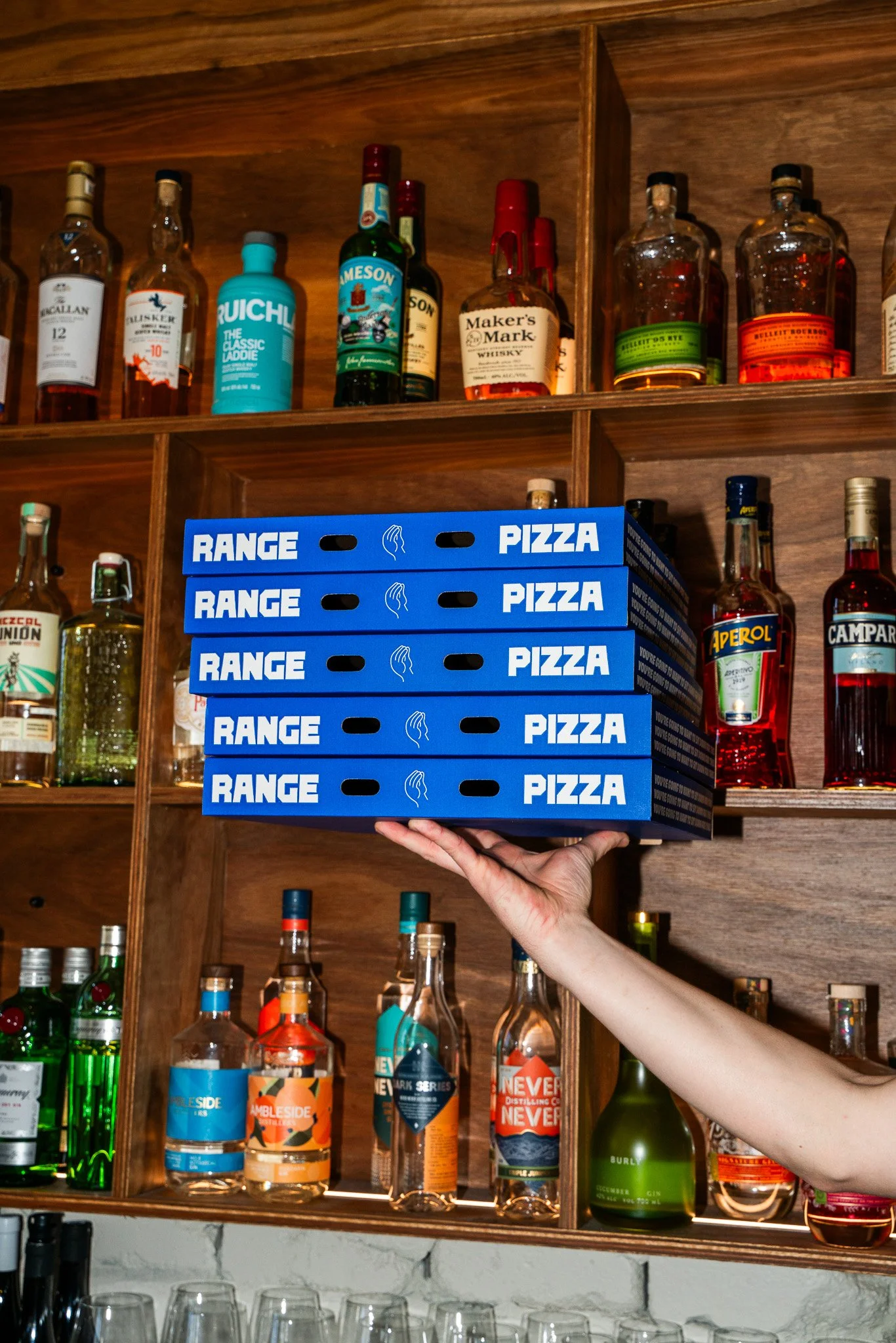 Stack of Takeway Pizza Boxes from Range Pizza.  Order Pickup in Camp Hill